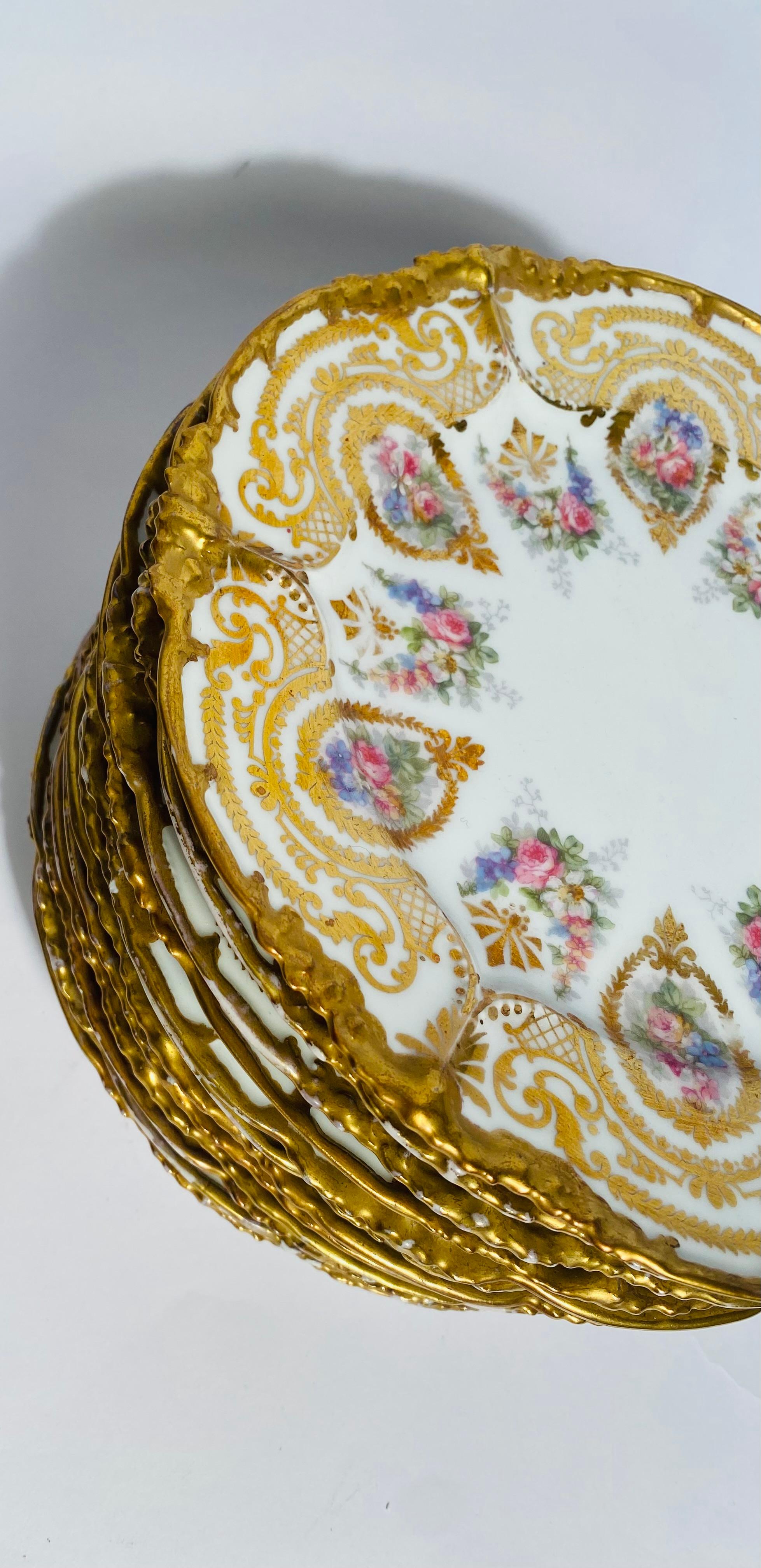 Gold 12 Antique Limoges Floral & Gilt Shaped Dessert Plates. Circa 1890 For Sale