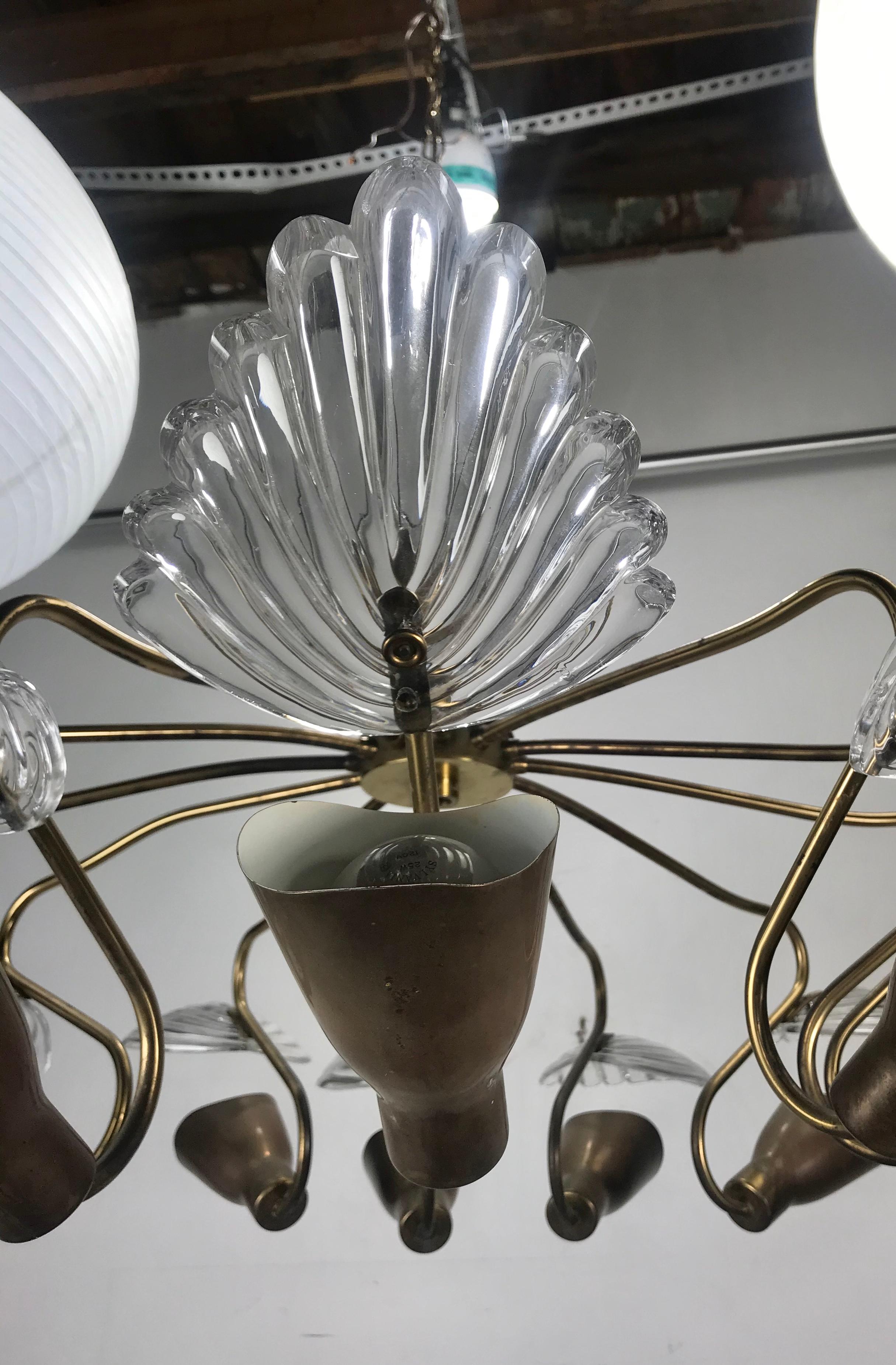 Large Italian modernist 12-arm chandelier, attributed to Stilnovo, Elegant design with flowing brass arms and glass fans, palms, amazing quality and construction, would enhance any modern, antique, eclectic environment, hand delivery avail to New