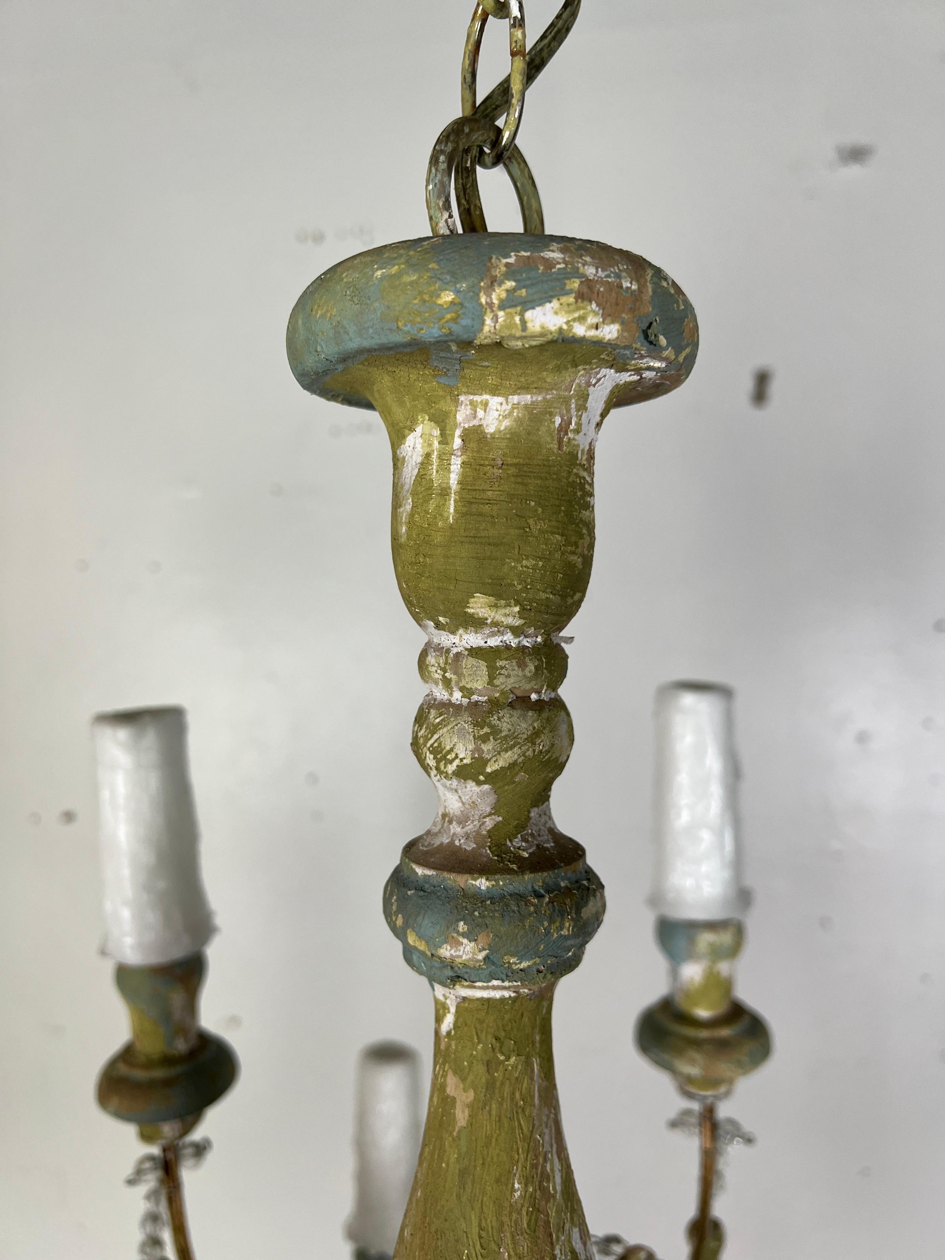 12-Arm Painted Wood Beaded Chandelier with Tassels In Distressed Condition For Sale In Los Angeles, CA