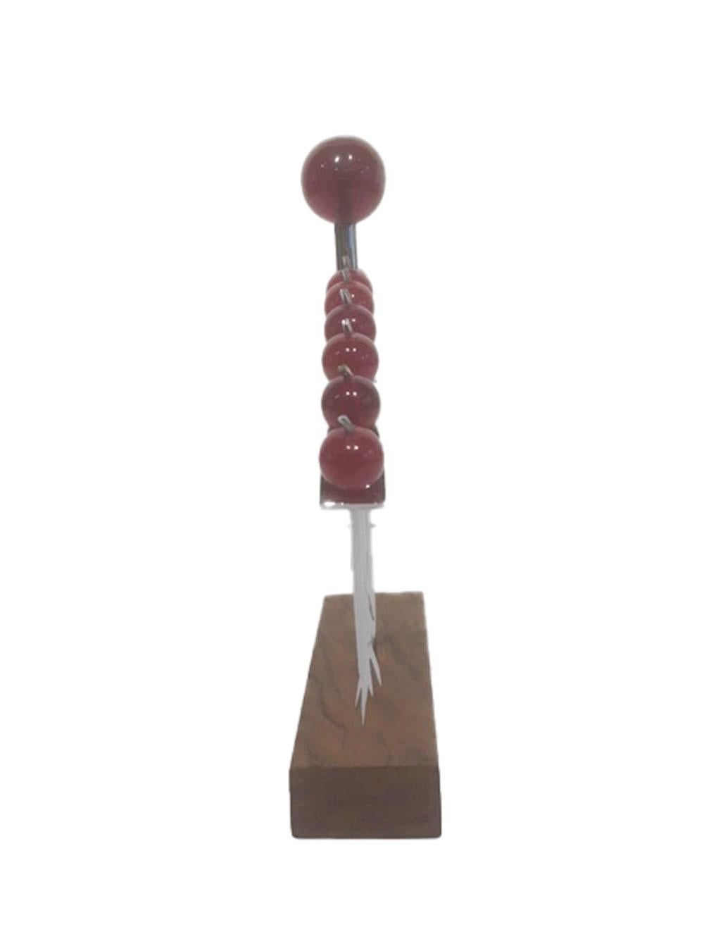 Plated 12 Art Deco Cocktail Picks in Chrome with Cherry Tops Hanging in Matching Stand For Sale
