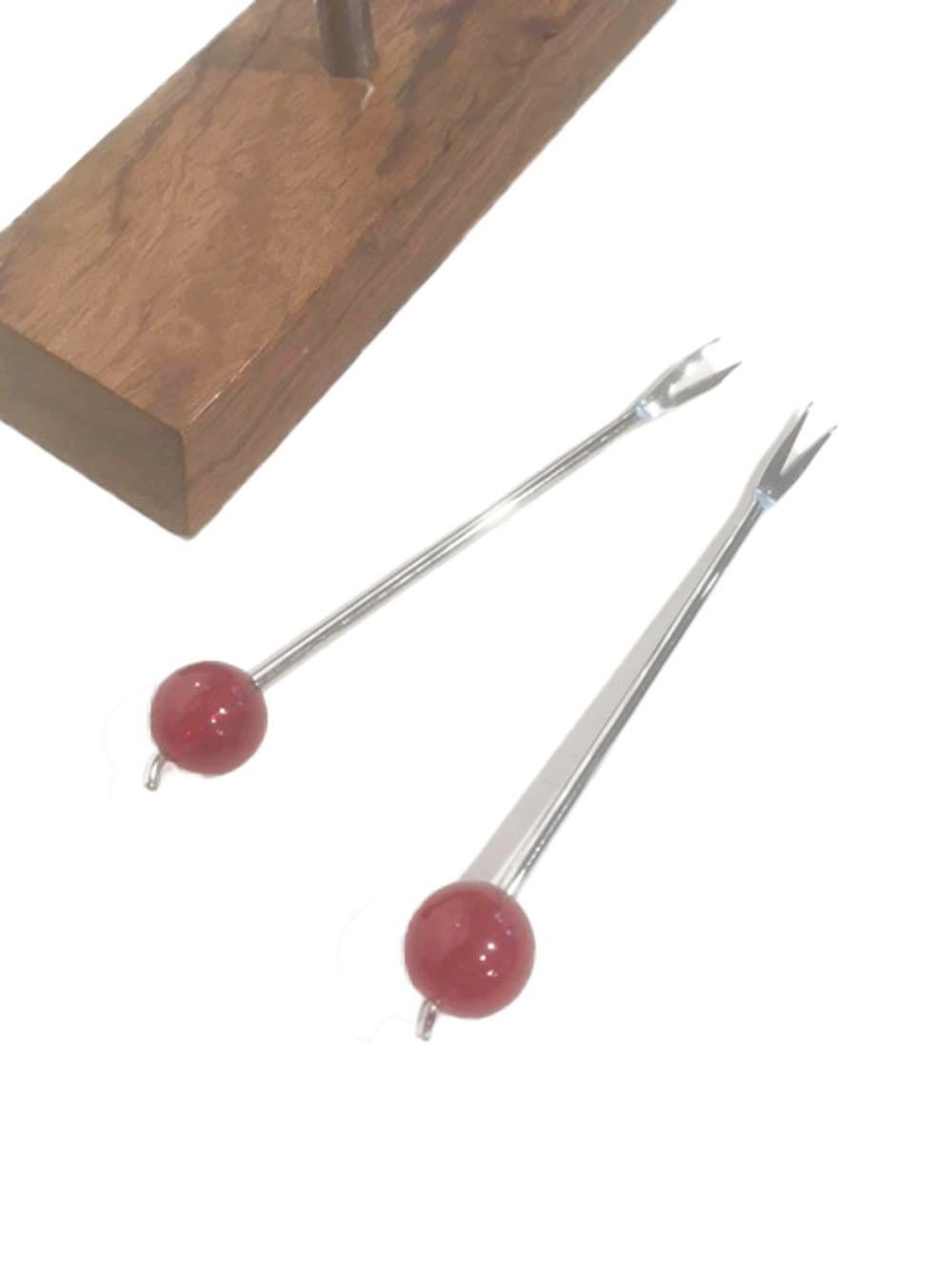 12 Art Deco Cocktail Picks in Chrome with Cherry Tops Hanging in Matching Stand In Good Condition For Sale In Nantucket, MA