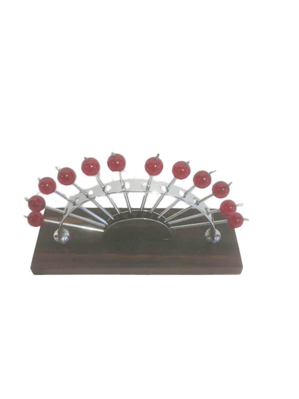 French 12 Art Deco Cocktail Picks with Cherry Red Tops in a Chrome Fan-Form Stand For Sale