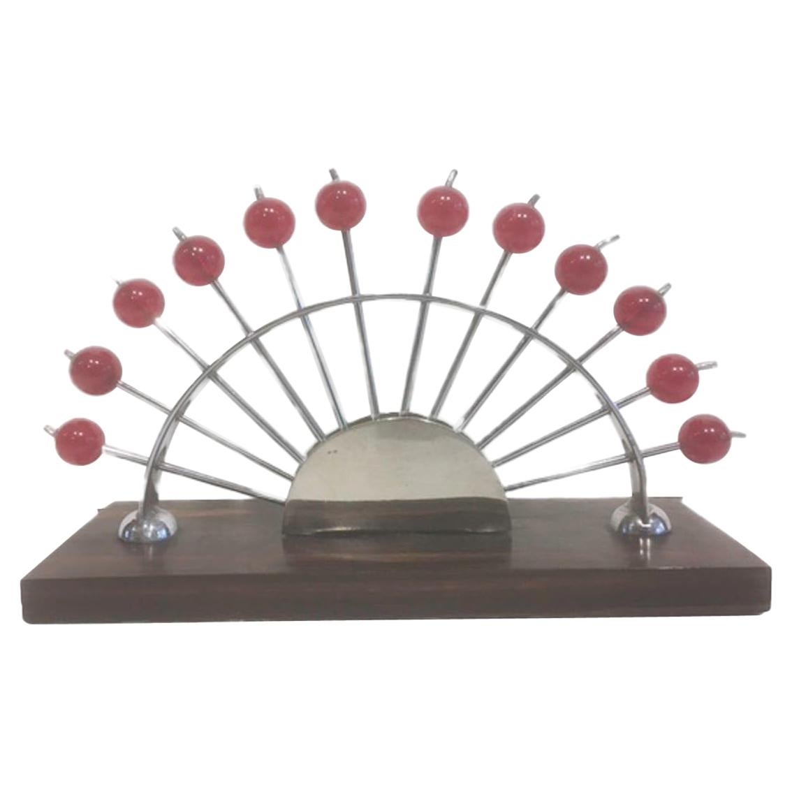 12 Art Deco Cocktail Picks with Cherry Red Tops in a Chrome Fan-Form Stand For Sale