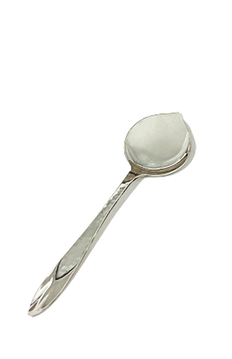12 Art Deco Dutch silver ice spoons by Gerritsen and Van Kempen (1926-1961).

These 12 Art Deco Dutch silver ice spoons are hammered and has a round, pointed with raised edge for scooping ice. This model is from 1930
Marked with the Dutch Silver