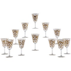 12 Baccarat Crystal Wine Goblets Intaglio Cut with Gilded Exotic Bird Motifs