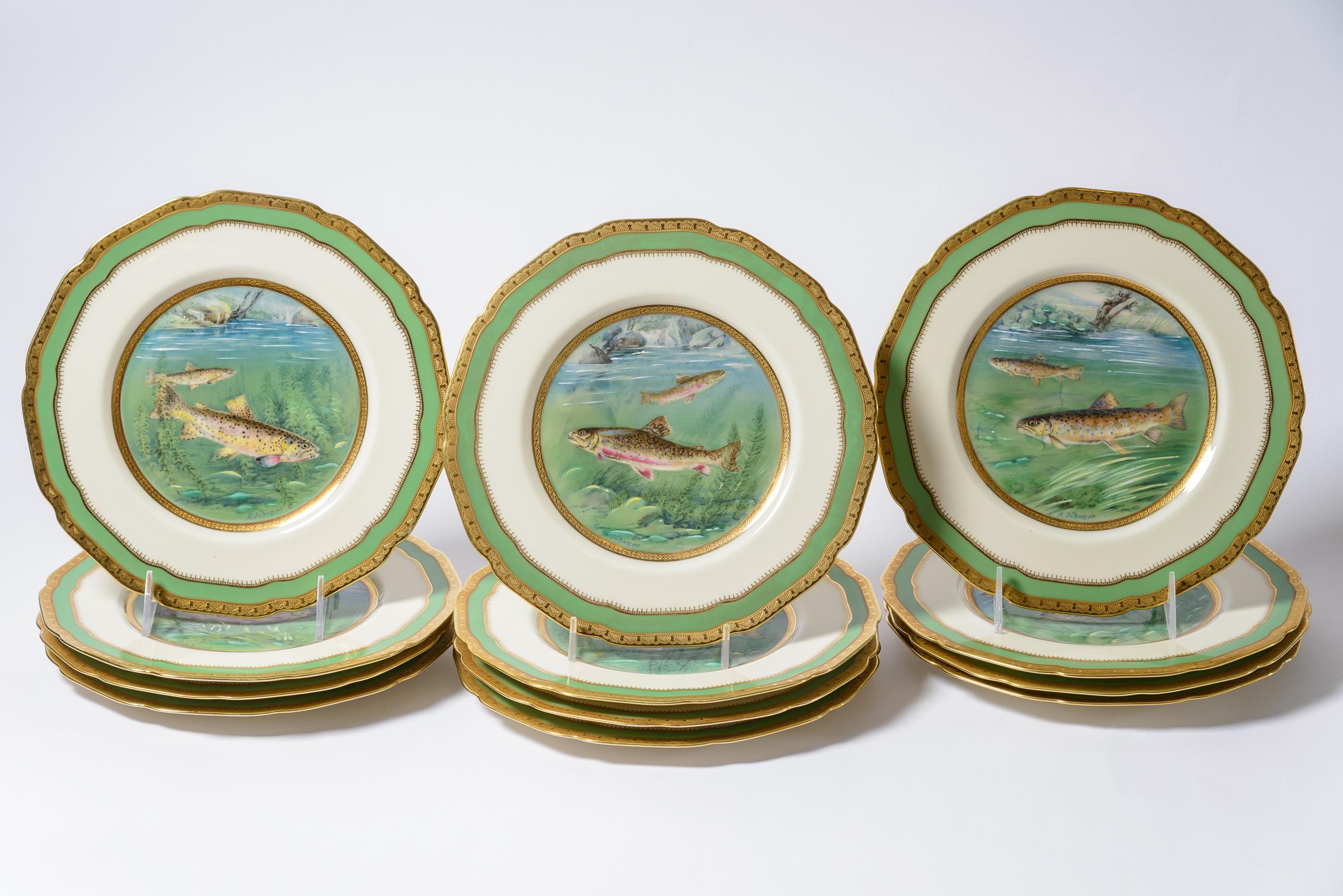A highly decorated set of fish plates by the re known firm of Black Knight (by the Hutchenreuther Porcelain Factory). Known for their elaborate decorations and color, this set has a nice all over scalloped shape accented with a vibrant green band
