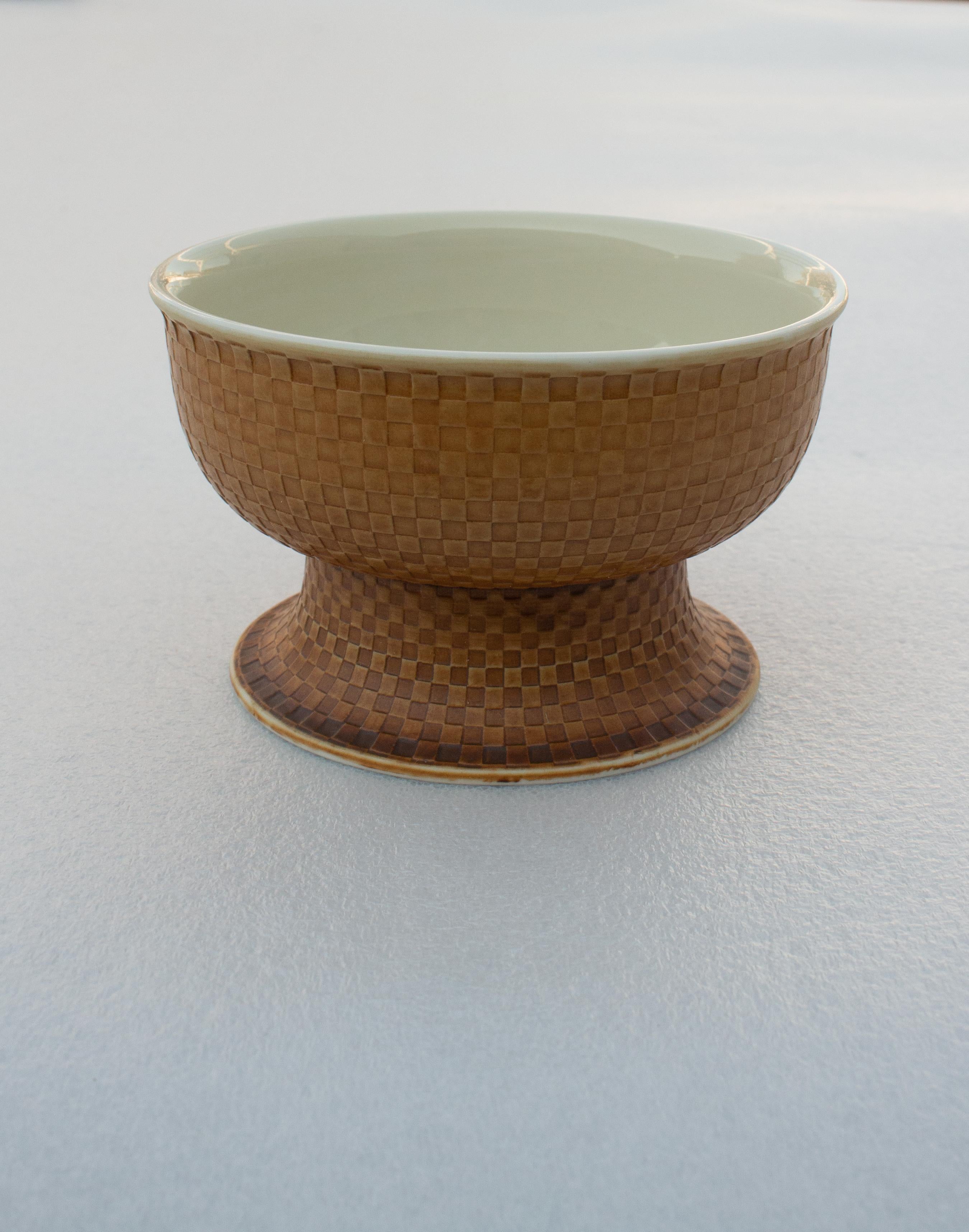 12 Bowls with terracotta glaze by Signe Persson Melin, (1925-2022) for Boda Nova, Sweden. She was a designer and craftsperson an was still working at the age of ninety. She has designed products in ceramics, metal, glass and concrete for companies