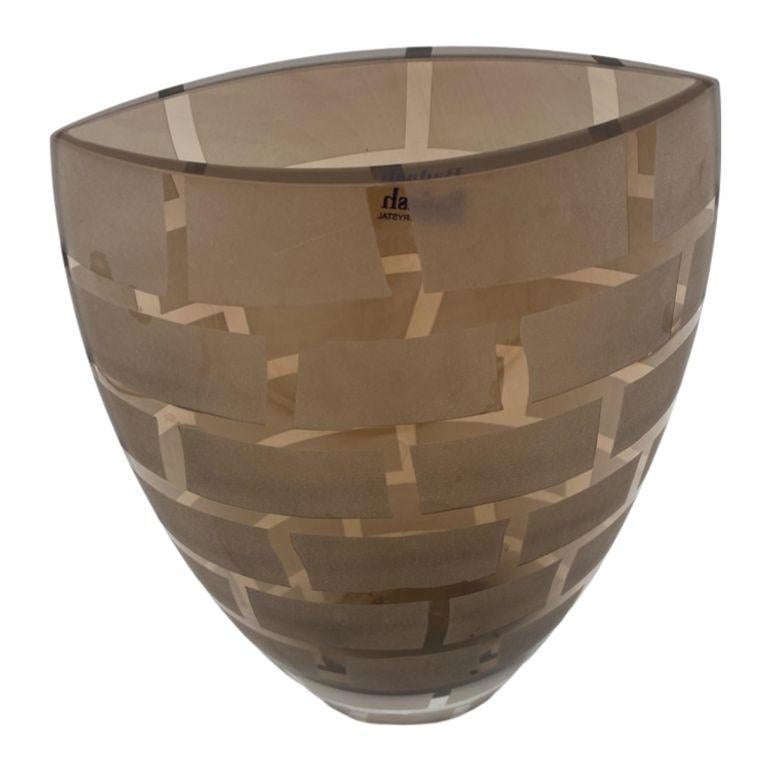 Original Modern Badash Champaign colored crystal vase. The piece was produced in a modern ovoid form with areas of acid etched frosted rectangles in the shape of a brick wall. The base has been cut, polished and is marked ‘Badash Handmade Crystal’