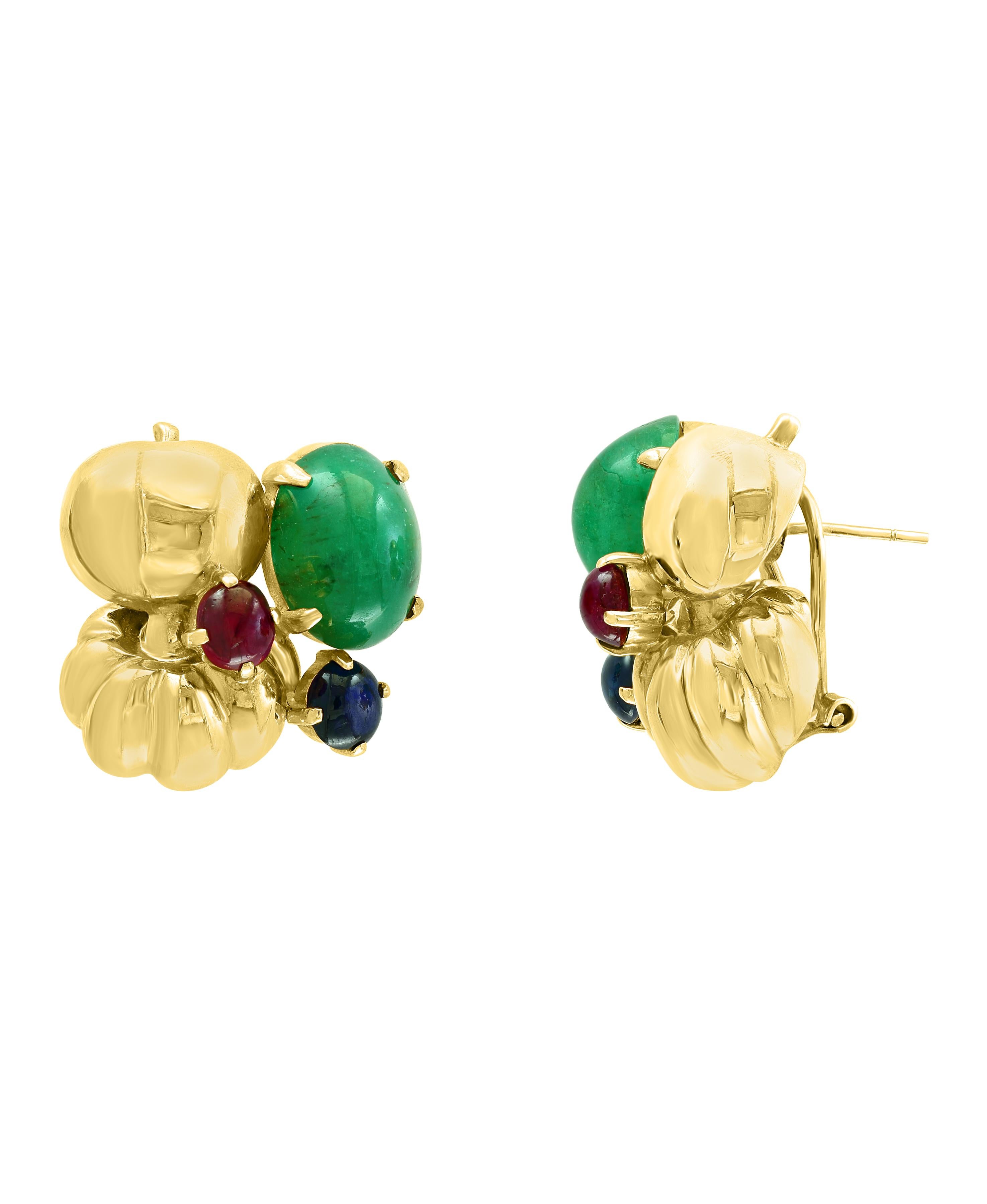 12 Carat  Cabochon Emerald Diamond Clip Earrings 14 Karat Yellow Gold, Estate
This exquisite pair of earrings are beautifully crafted with 14 karat Yellow gold  weighing   22 grams
Two  Emerald  Cabochon weighing approximately 12 carats with no
