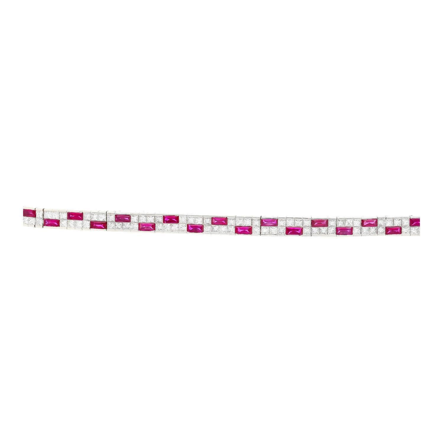 Channel, Bezel, and Pave Set Natural Ruby and Diamond Art deco Style Geometric Two-Row Bracelet in 18K White Gold. 12 carats total of rubies and diamonds.

Details: 
✔ Item Type: Bracelet
✔ Metal: 18k White Gold
✔ Size: 7.25 inches 
✔ Weight: 28