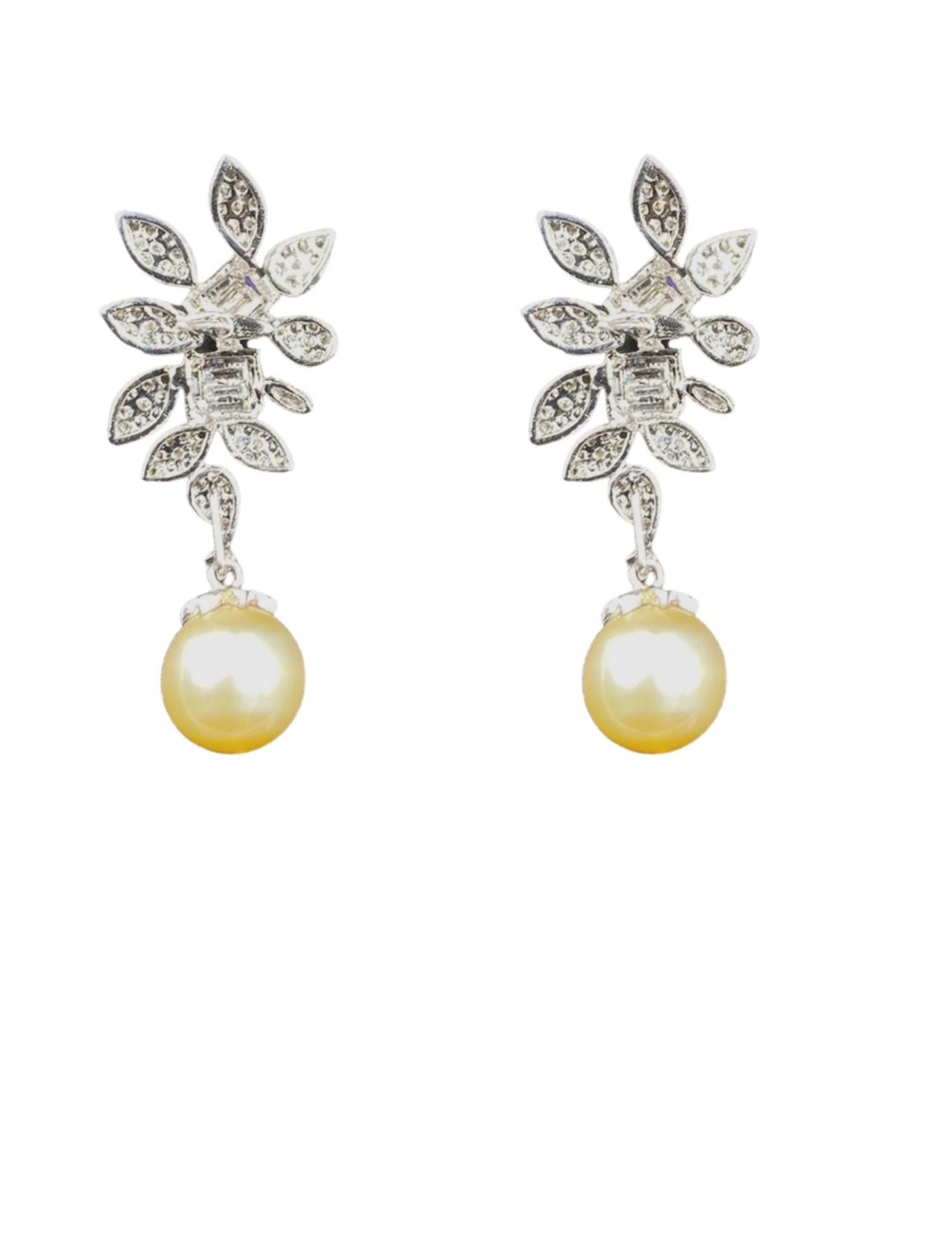 The Eleanor earring features a pair of South Sea Pearls, dropped from timeless diamond baguette earring, made in 18K white gold.


South Sea Cultured Pearl
Shape	Drop
Color	Cream
Quality	Fine
Weight	17.5 carats
 	 
Diamond Details
Shape	Round