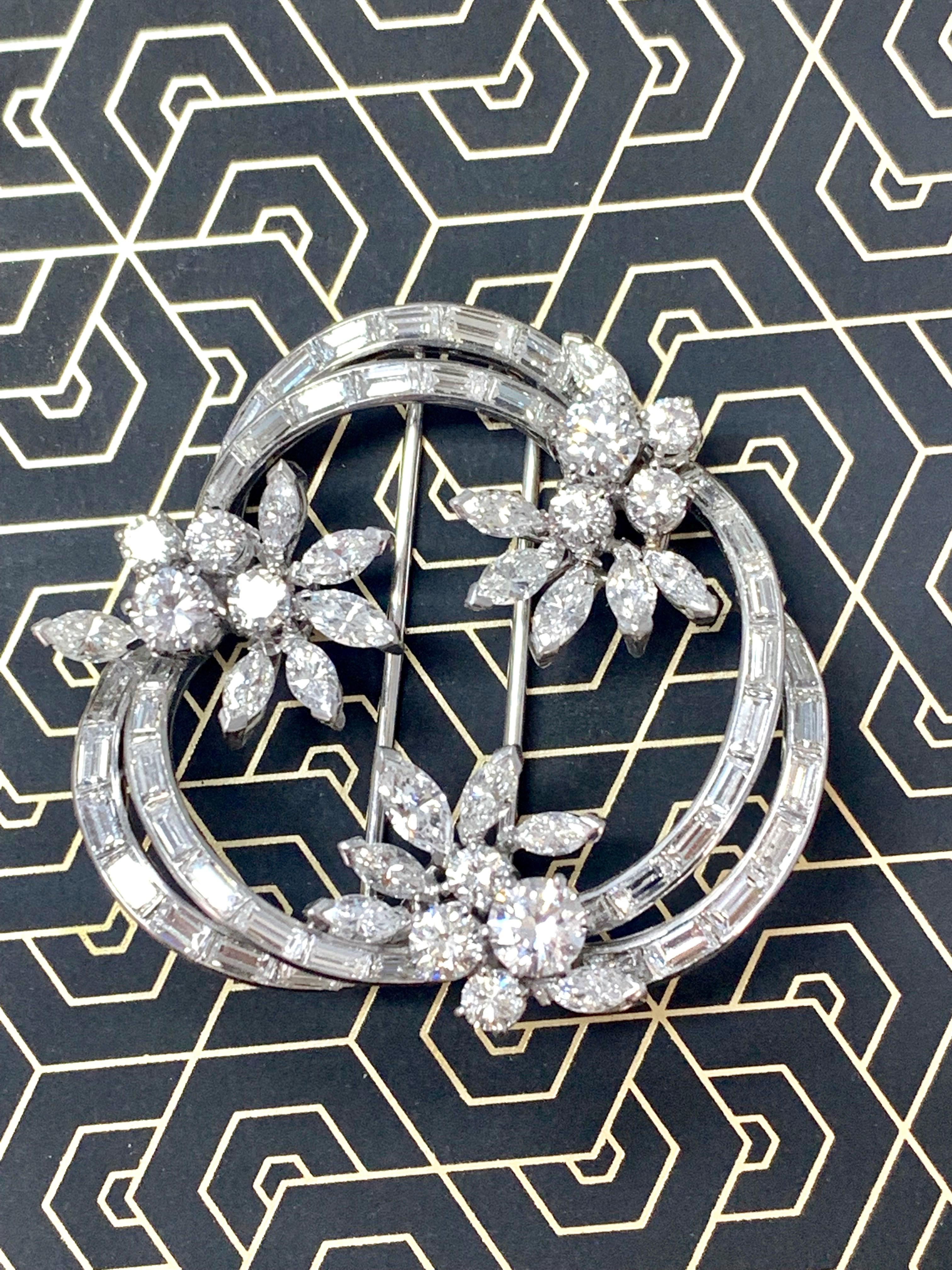 Gorgeous 12 carat diamond broach in platinum. 
The details are as follows : 
Diamond weight : 12 carat ( G color and VS 2 clarity ) 
Metal : platinum 
Measurements : 1.70