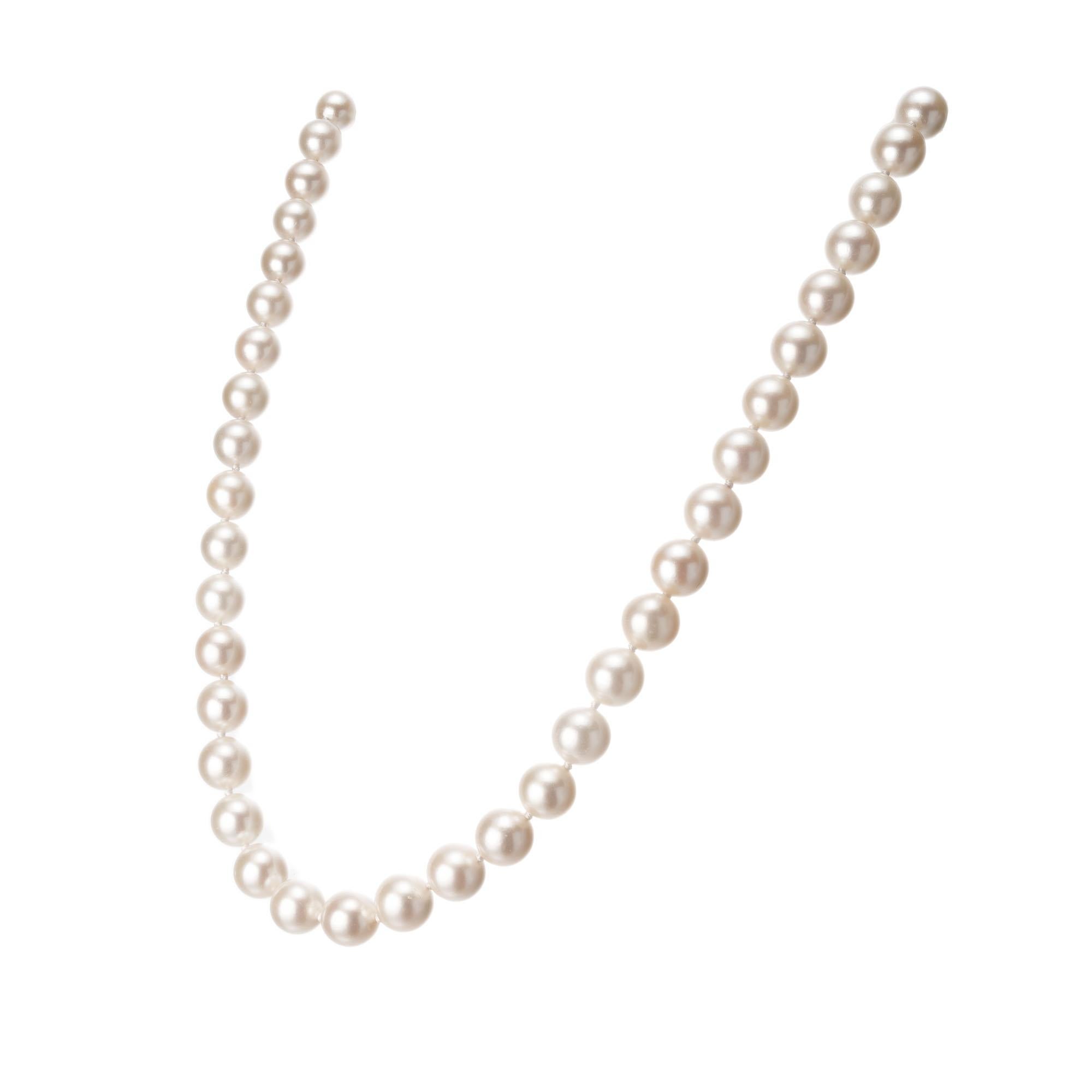 1970's 8.5mm, 18-Inch cultured pearl necklace with double sided 18k white gold diamond catch. Pearls are white light natural cream overtone well matched, good lustre, few blemishes. 18 inches long

47 cultured pearls 8.5mm
18 round brilliant cut
