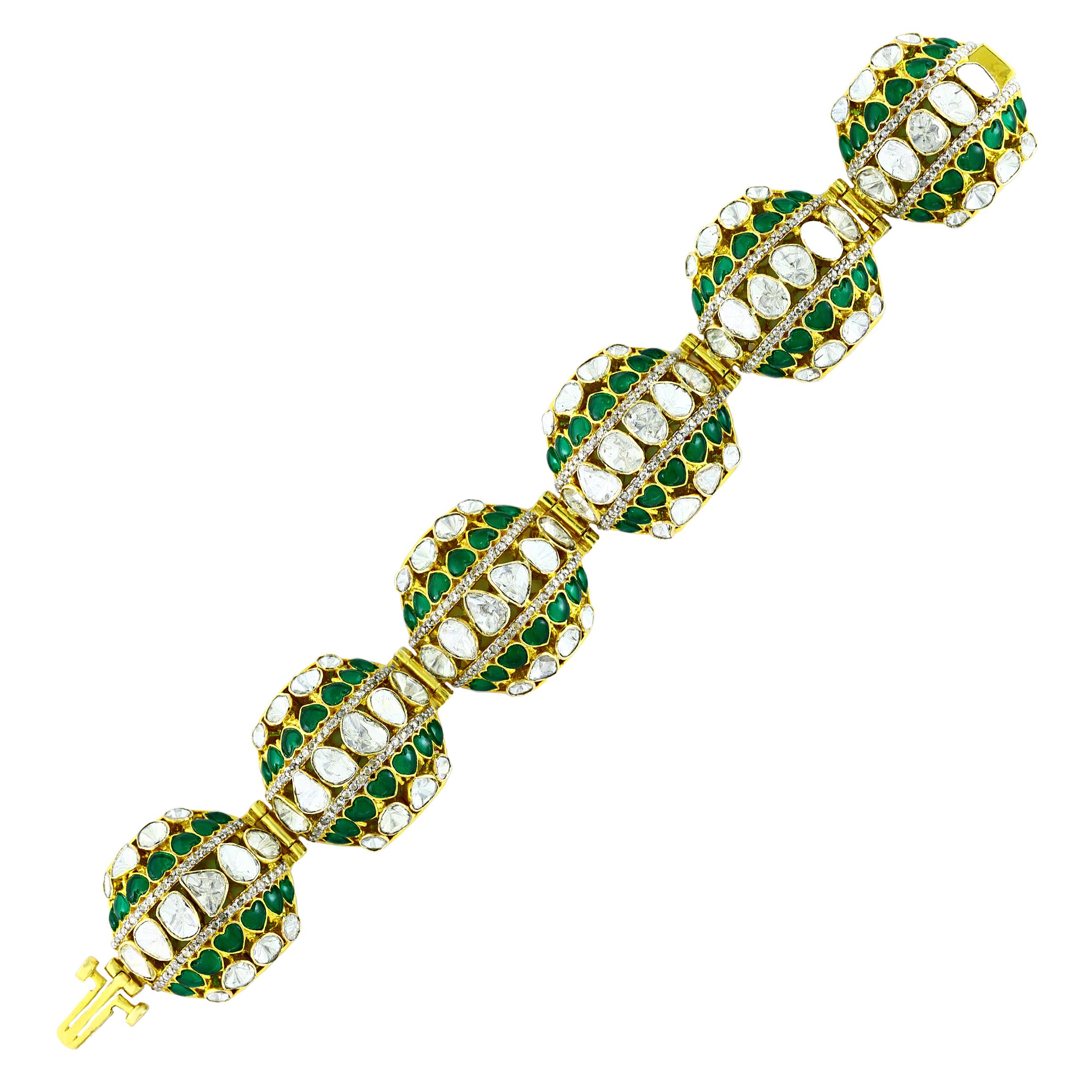 One of the best  bracelet you will come across
12 Carat Diamond  Bangle /Bracelet In 18 Karat Yellow Gold 58 Grams.
It features a bangle style  Bracelet crafted from an 18k Yellow gold and embedded with   all different shape of big  polki  diamonds