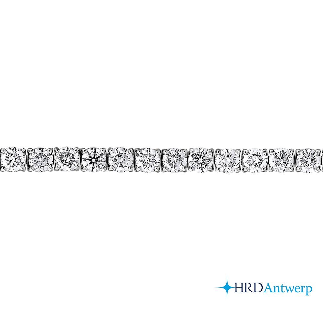 Make a Registo and statement with this gorgeous diamond tennis bracelet. Shimmering in cool 18K white gold, this beautiful bracelet showcases 1/3 ct. Each diamond boasts a color rank of F-G and clarity of VS1 for a truly stunning look. This bracelet