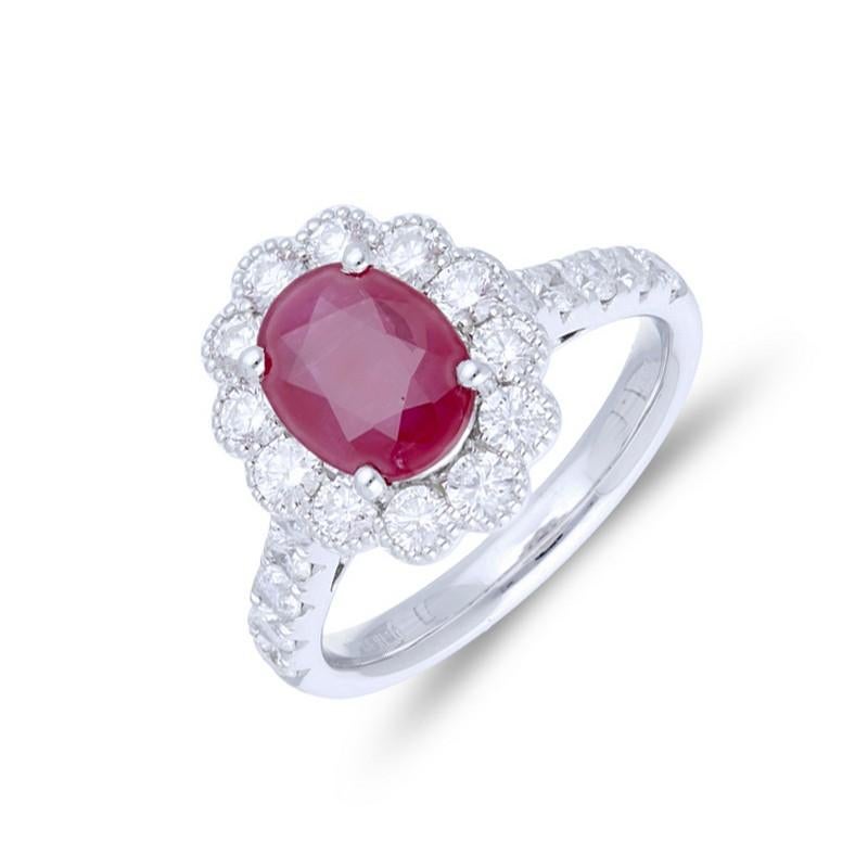 Diamond and Ruby Carat Weight: This stunning Vow Collection ring showcases a total of 1.2 carats of round diamonds and a central oval ruby weighing 2.2 carats. The combination of diamonds and ruby adds a touch of color and sophistication to the