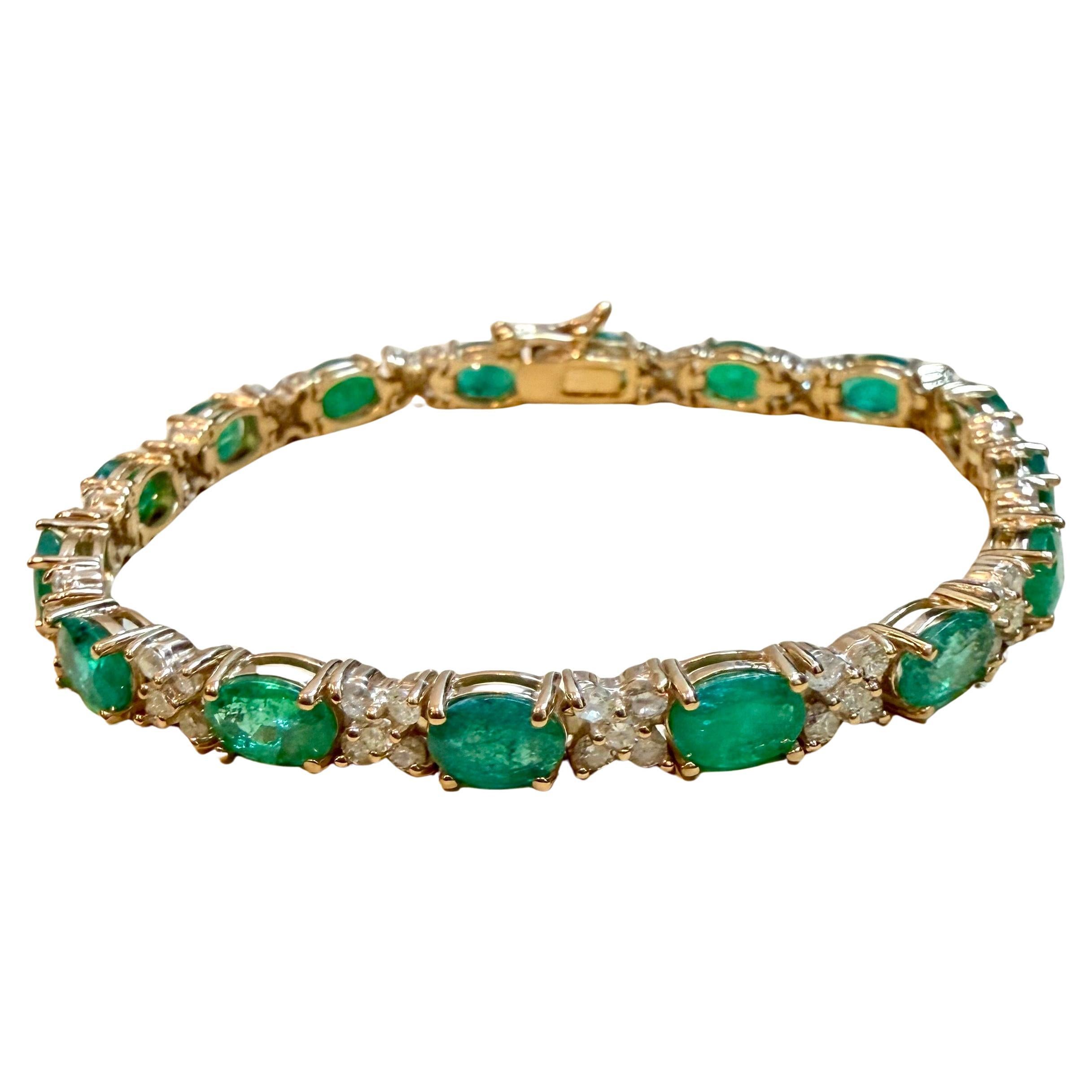 Oval Cut 12 Carat Emerald 2.2 Carat Diamond Flower Tennis Bracelet 14 Karat Yellow Gold For Sale