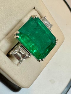 12 Carat Emerald Cut Colombian Emerald and 1.6 Carat Diamond 18 Karat Gold Ring