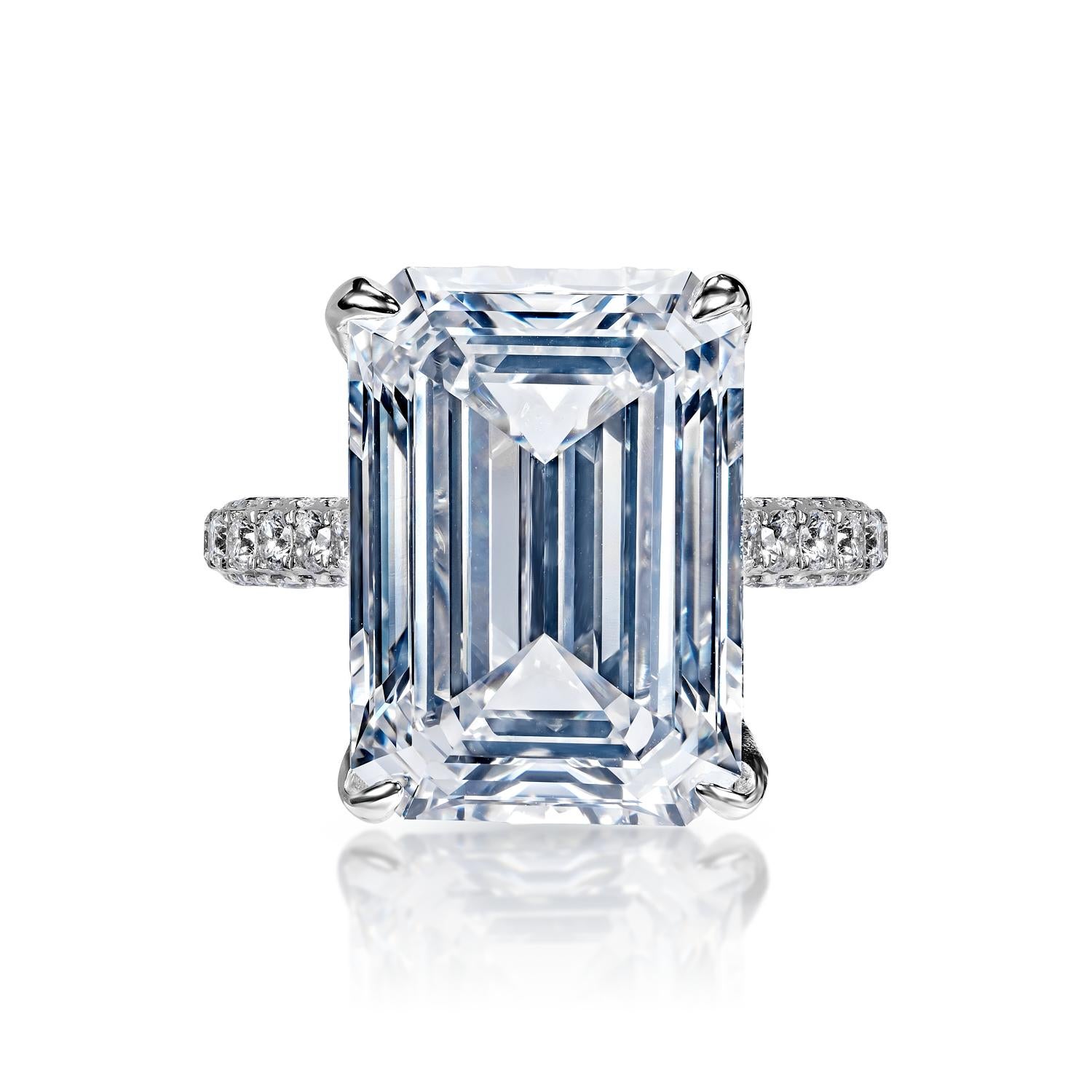 GIA CERTIFIED
Center Diamond:

Carat Weight: 10.40 Carats
Color : E*
Clarity: VVS1
Style: Emerald Cut

*This Diamond has been treated by one or more processes to change its color

Ring:
Metal: 18 Karat White Gold
Settings: 4 Petite Claw Prong &