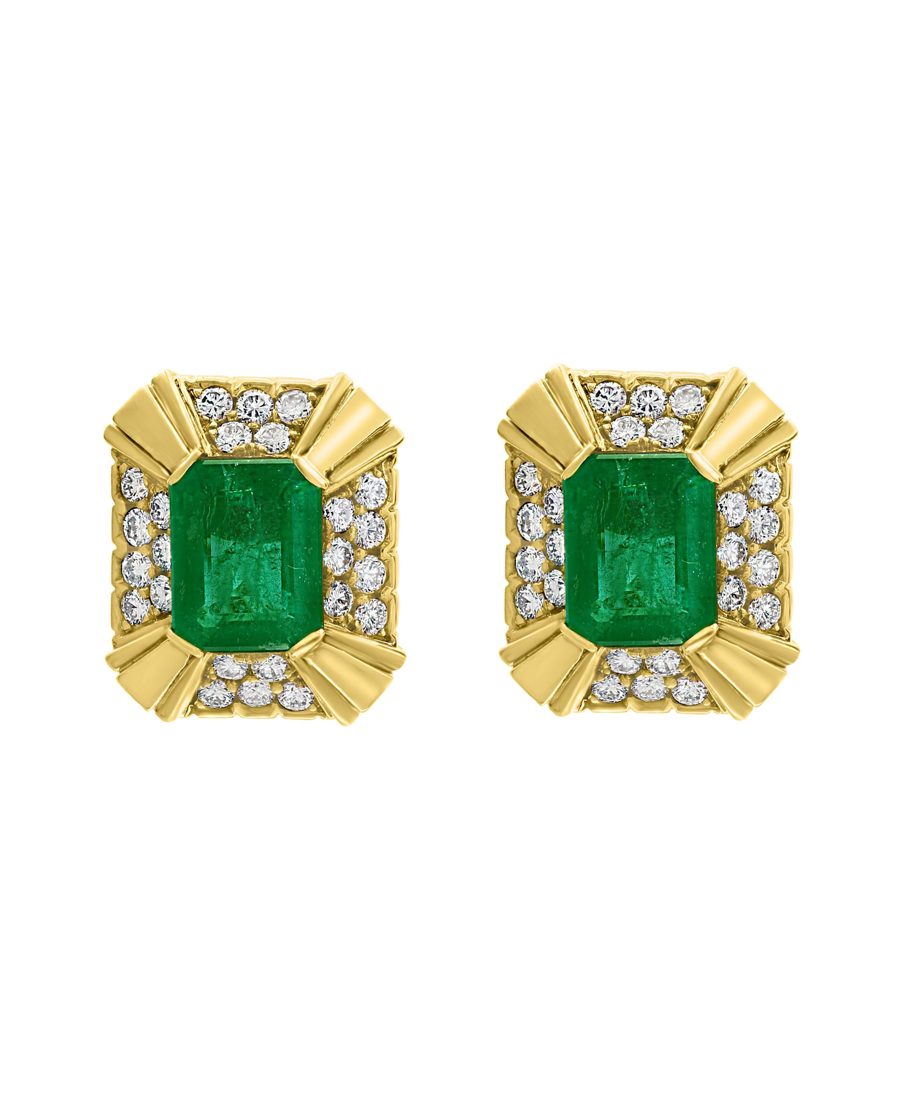 12 Carat  Emerald Cut Emerald Diamond Clip Earrings 18 Karat Yellow Gold, Estate
This exquisite pair of earrings are beautifully crafted with 18 karat Yellow gold  weighing   25 grams
Two fine Emerald  Cut Emeralds weighing approximately 12 carats