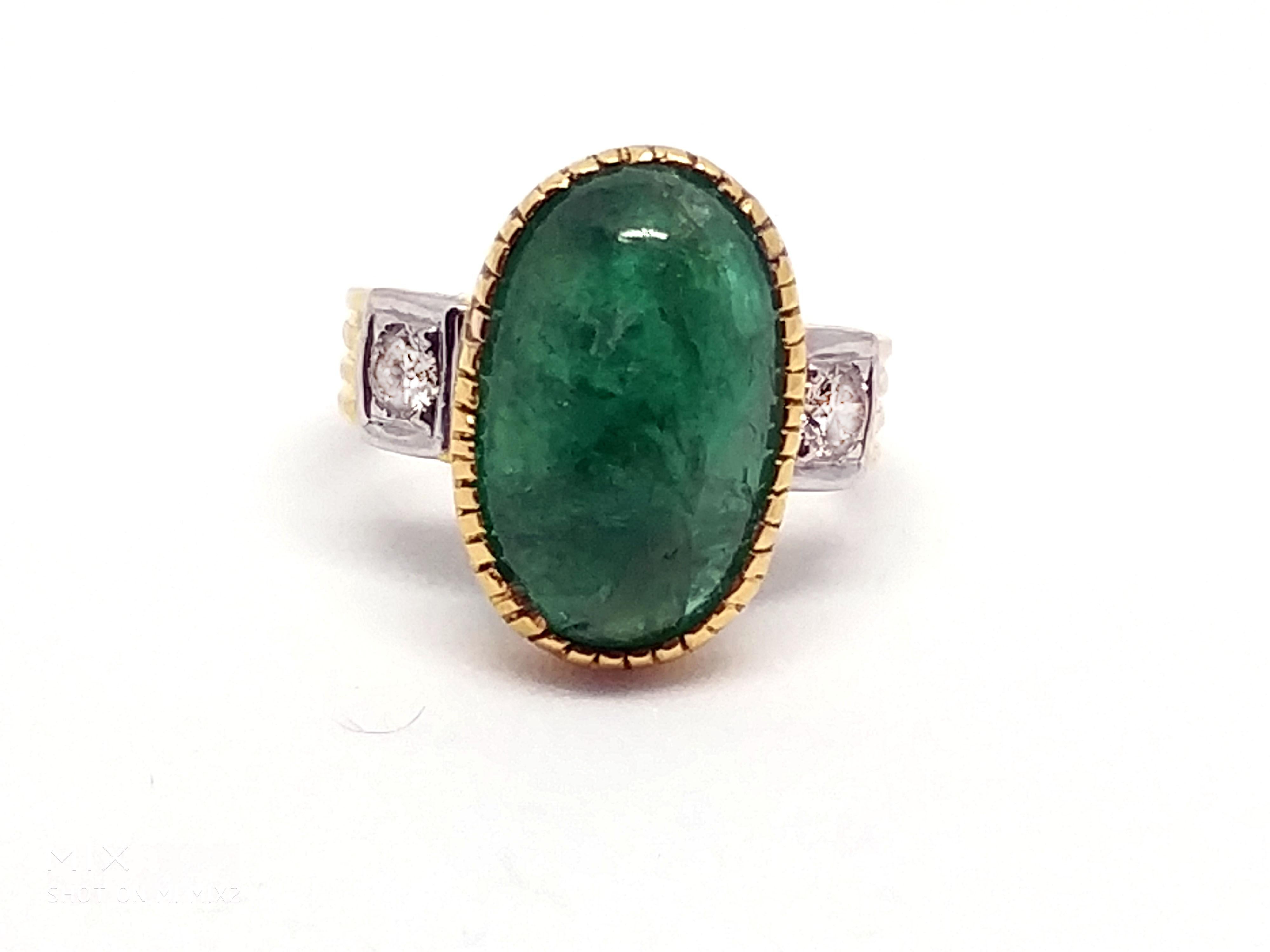 Most beautiful and very intensely and evenly coloured emerald stone 
11.48 carat certified emerald and
Two diamonds of 0.3 carats each totalling 0.6 carat 
in 18 carat yellow gold