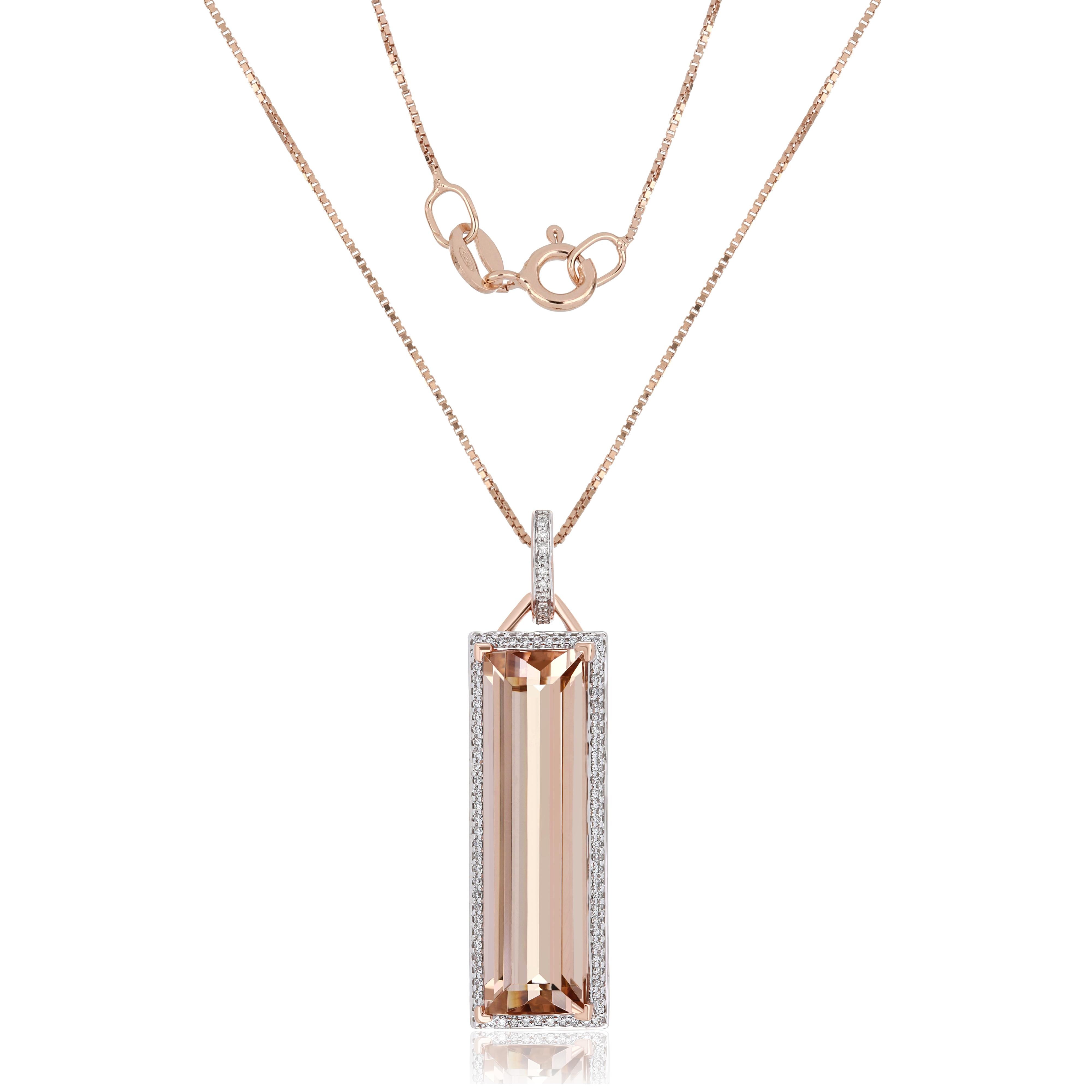 Elegant and exquisitely detailed Cocktail 14K Pendant, center set with 12.65 Cts. (approx) Elongated Octagon Cut Morganite. Surrounded with Diamonds, weighing approx. 0.23 ct. Beautifully Hand crafted in 14 Karat Rose Gold.

Stone Size:
Morganite: