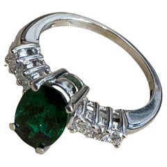 Tourmaline verte ovale naturelle de 1,2 carat + diamant  Bague en or jaune 14 carats
