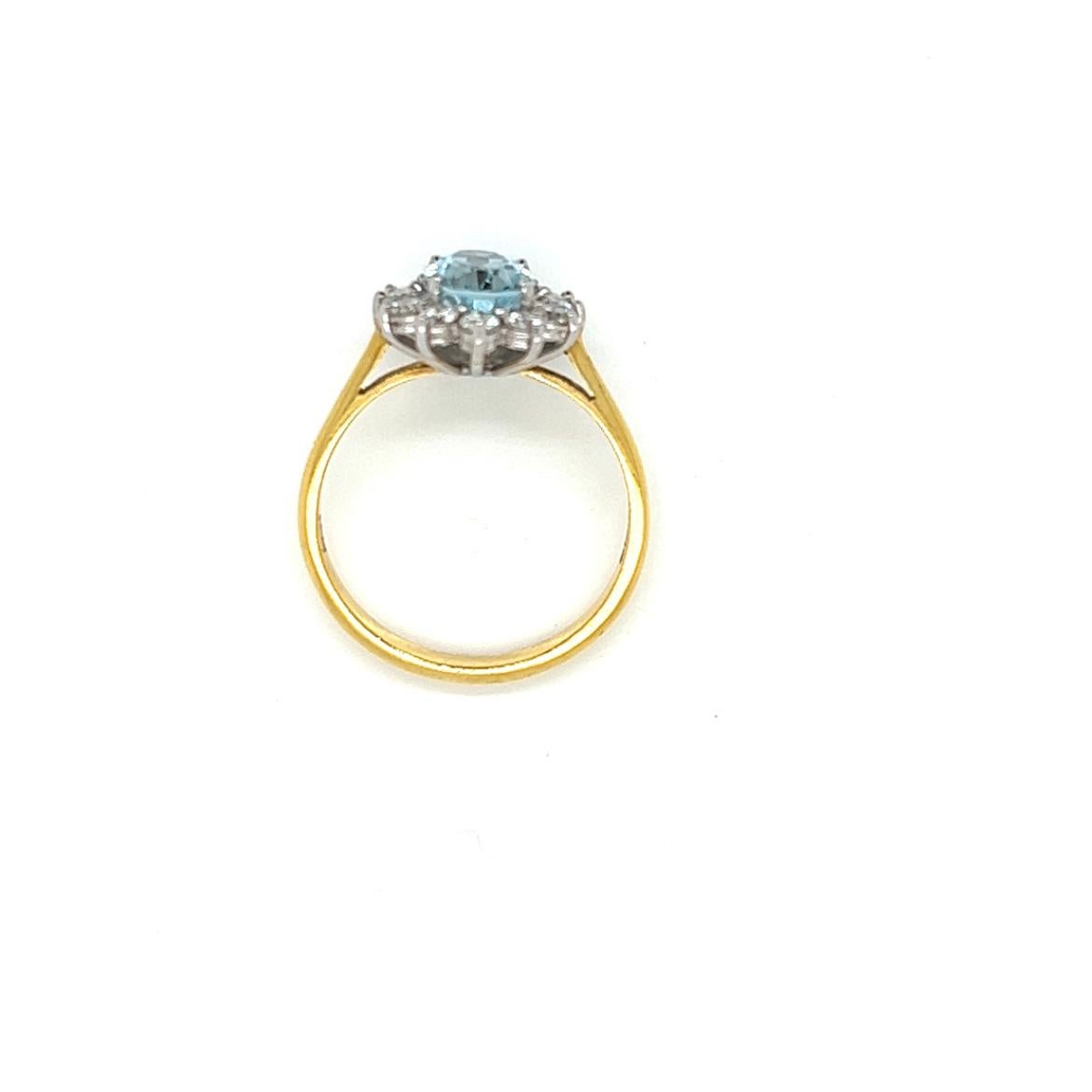 Oval Cut 1.2 Carat Oval Aquamarine and Diamond Cluster Ring in 18K Yellow and White Gold For Sale