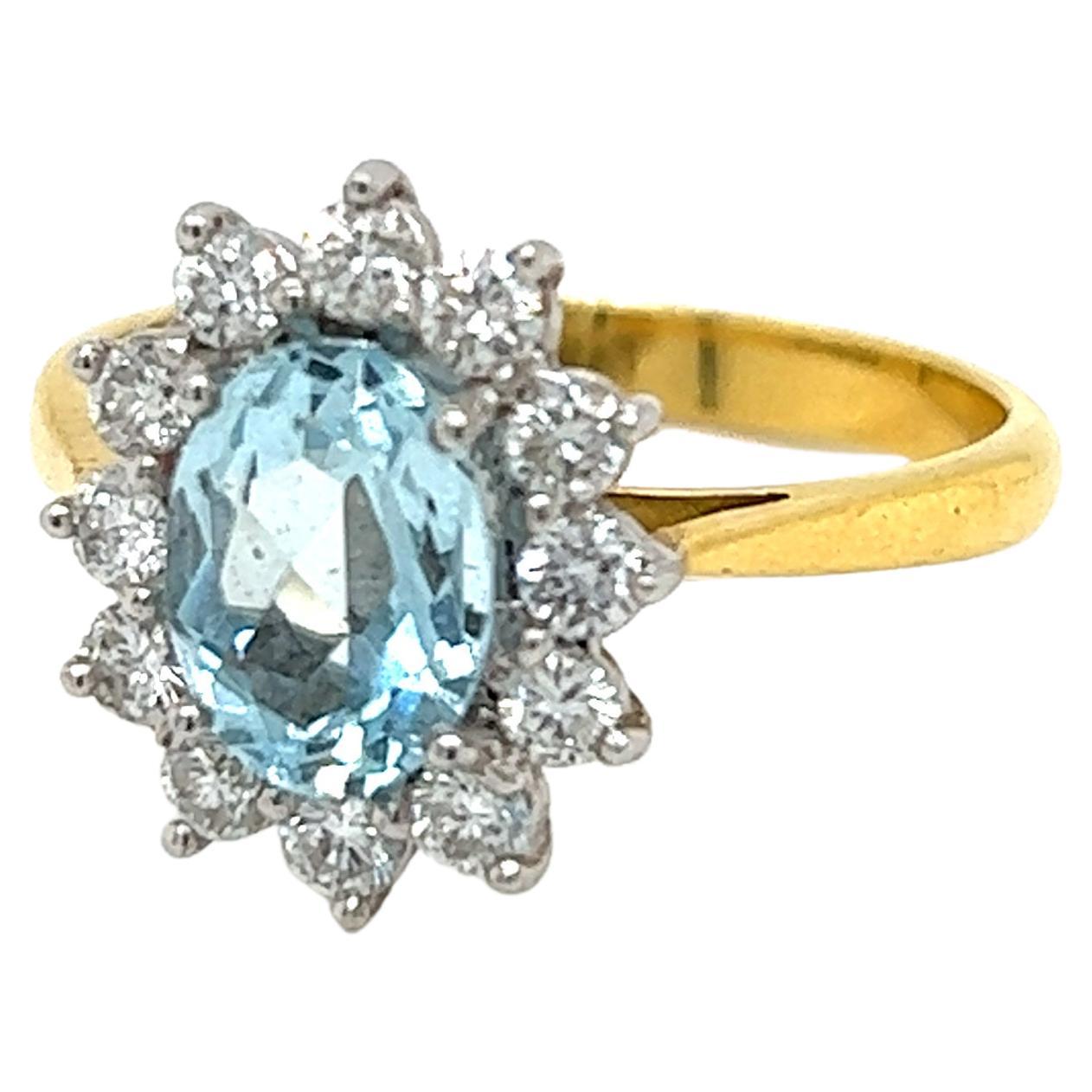 1.2 Carat Oval Aquamarine and Diamond Cluster Ring in 18K Yellow and White Gold For Sale