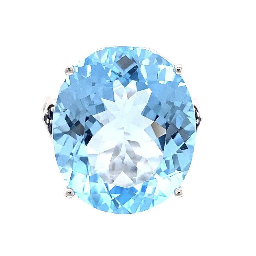 Oval Cut 12 Carat Oval Blue Topaz and Sapphire Gold Solitaire Statement Cocktail Ring For Sale