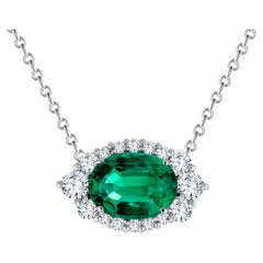 1.2 Carat Oval Emerald Pendant with 0.40 ct Diamond Halo ref917