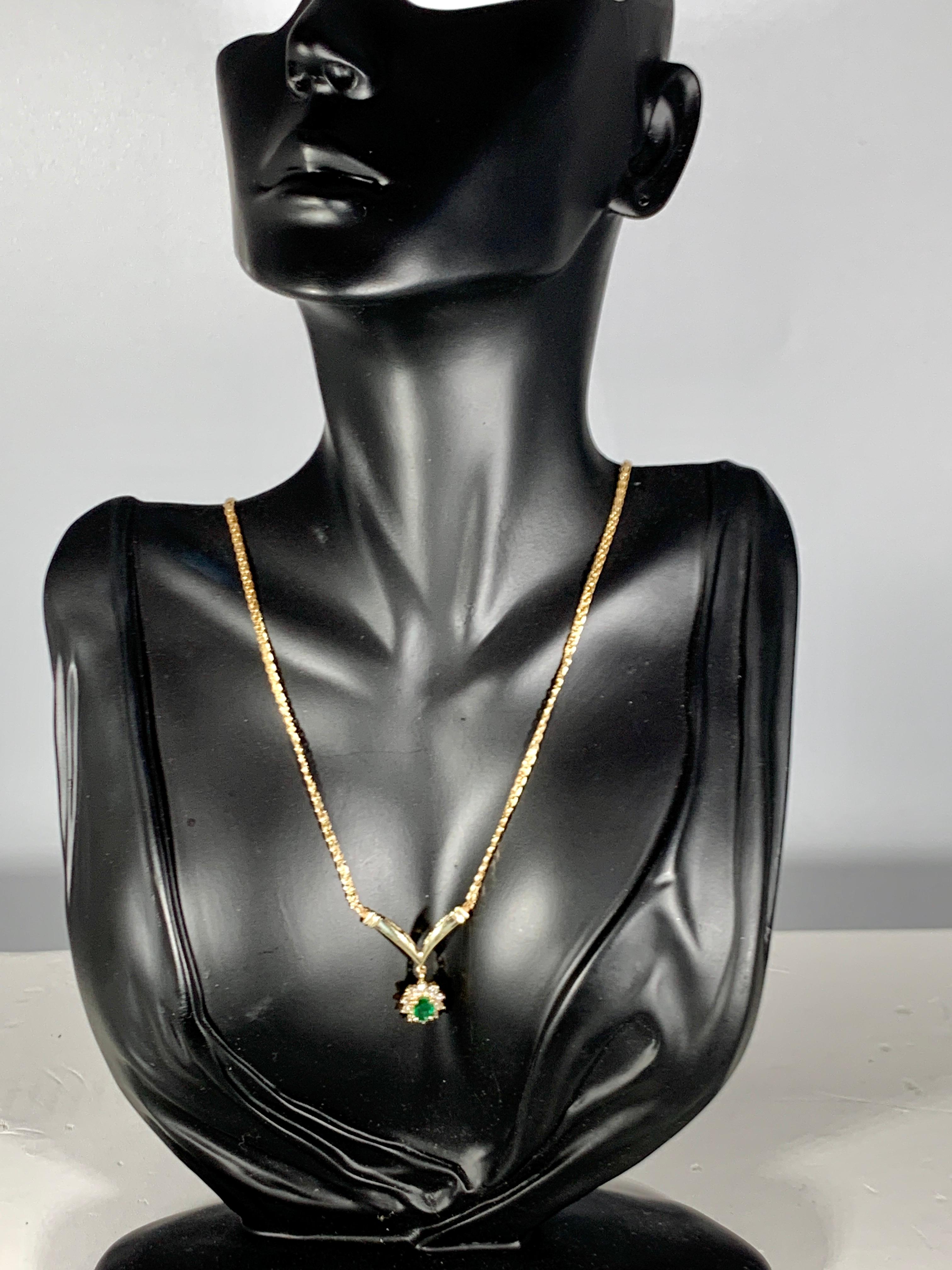 1.2 Carat Oval Shape Emerald & .5 Carat Diamond Necklace in 14 Karat Yellow Gold 6