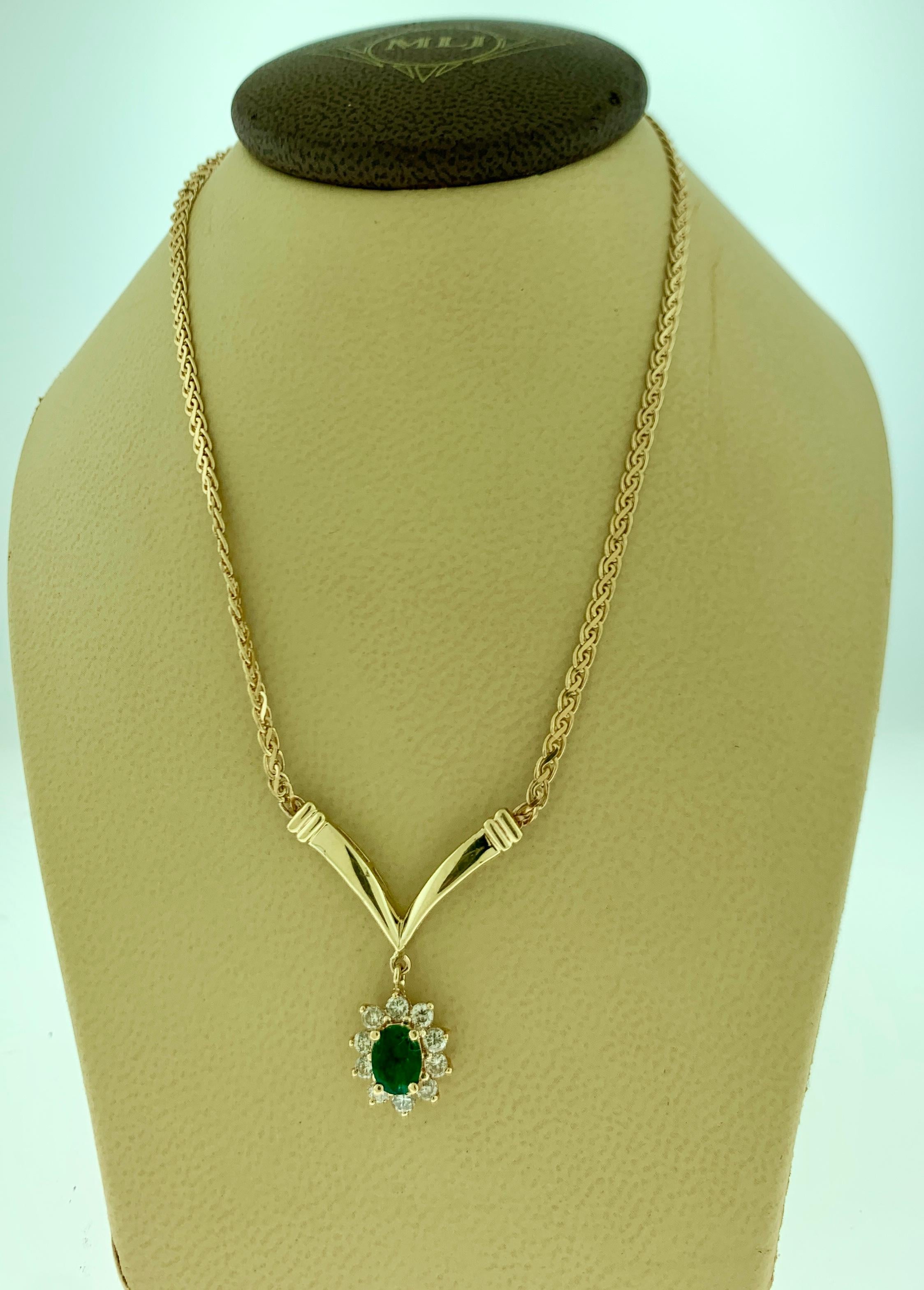 1.2 Carat Oval Shape Emerald & .5 Carat Diamond Necklace in 14 Karat Yellow Gold 9