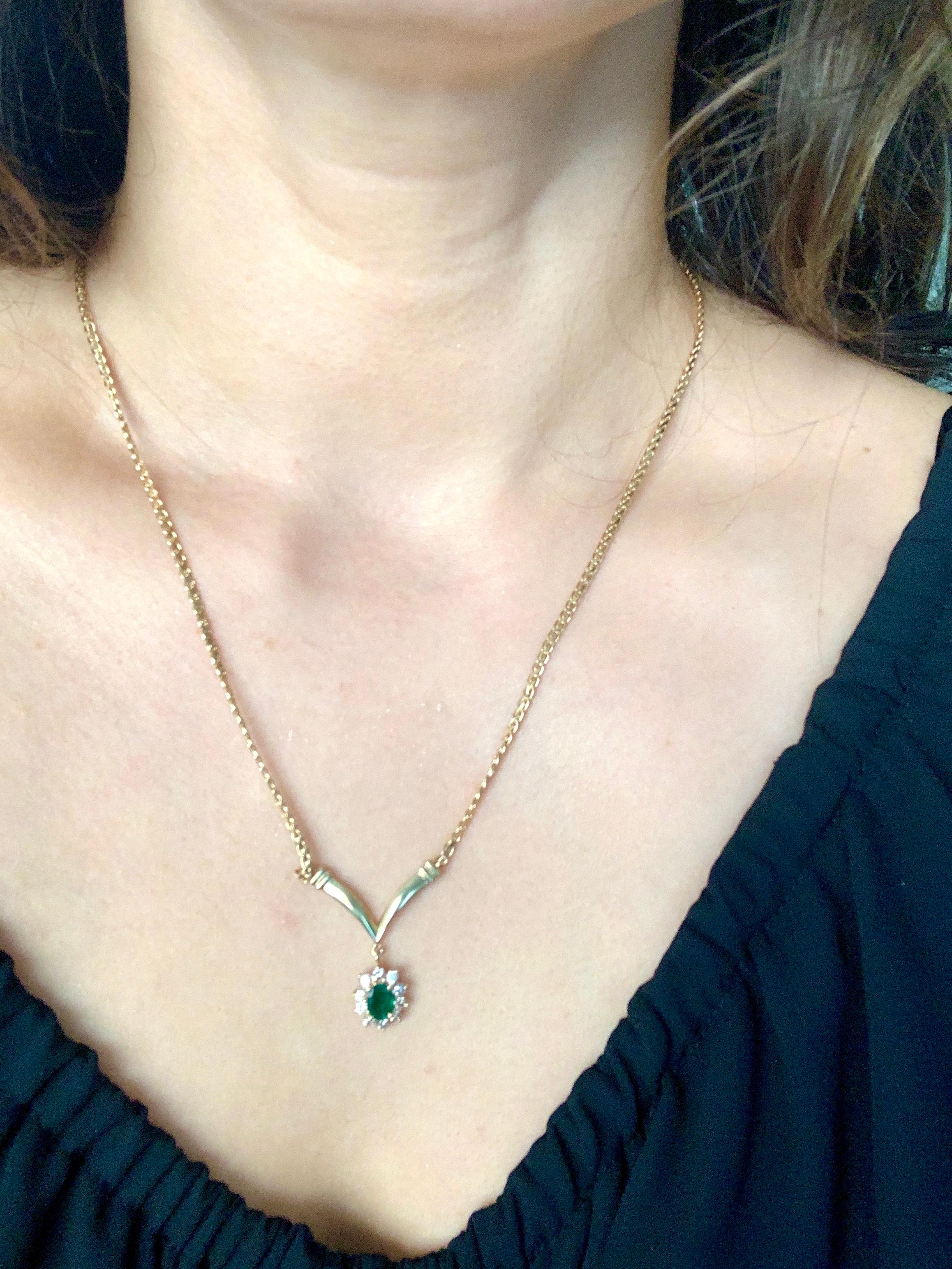 1.2 Carat Oval Shape Emerald & .5 Carat Diamond Necklace in 14 Karat Yellow Gold 10