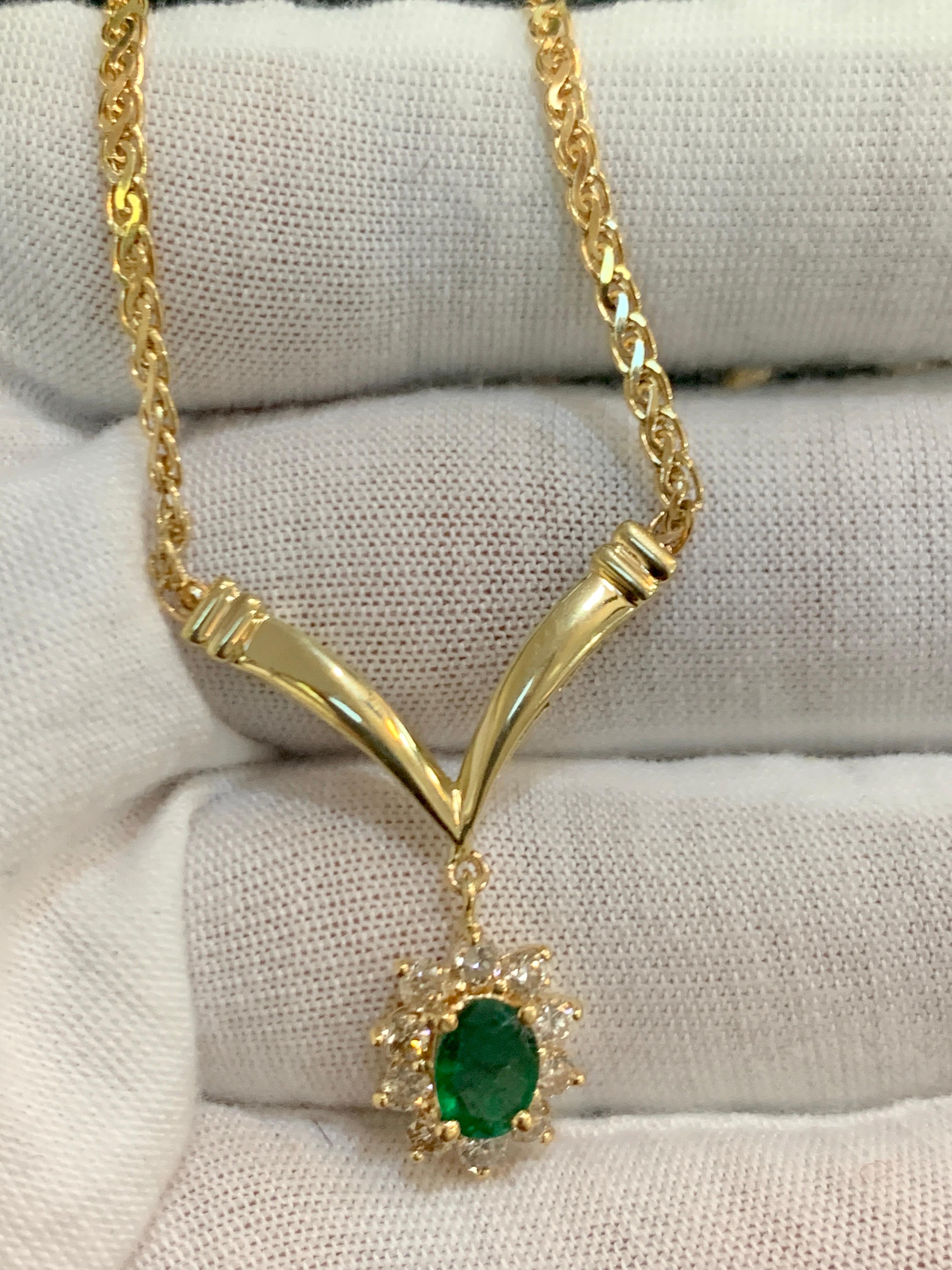 Women's 1.2 Carat Oval Shape Emerald & .5 Carat Diamond Necklace in 14 Karat Yellow Gold
