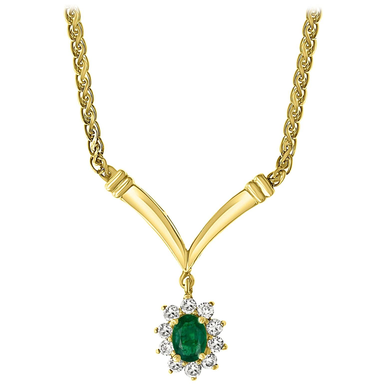 1.2 Carat Oval Shape Emerald & .5 Carat Diamond Necklace in 14 Karat Yellow Gold