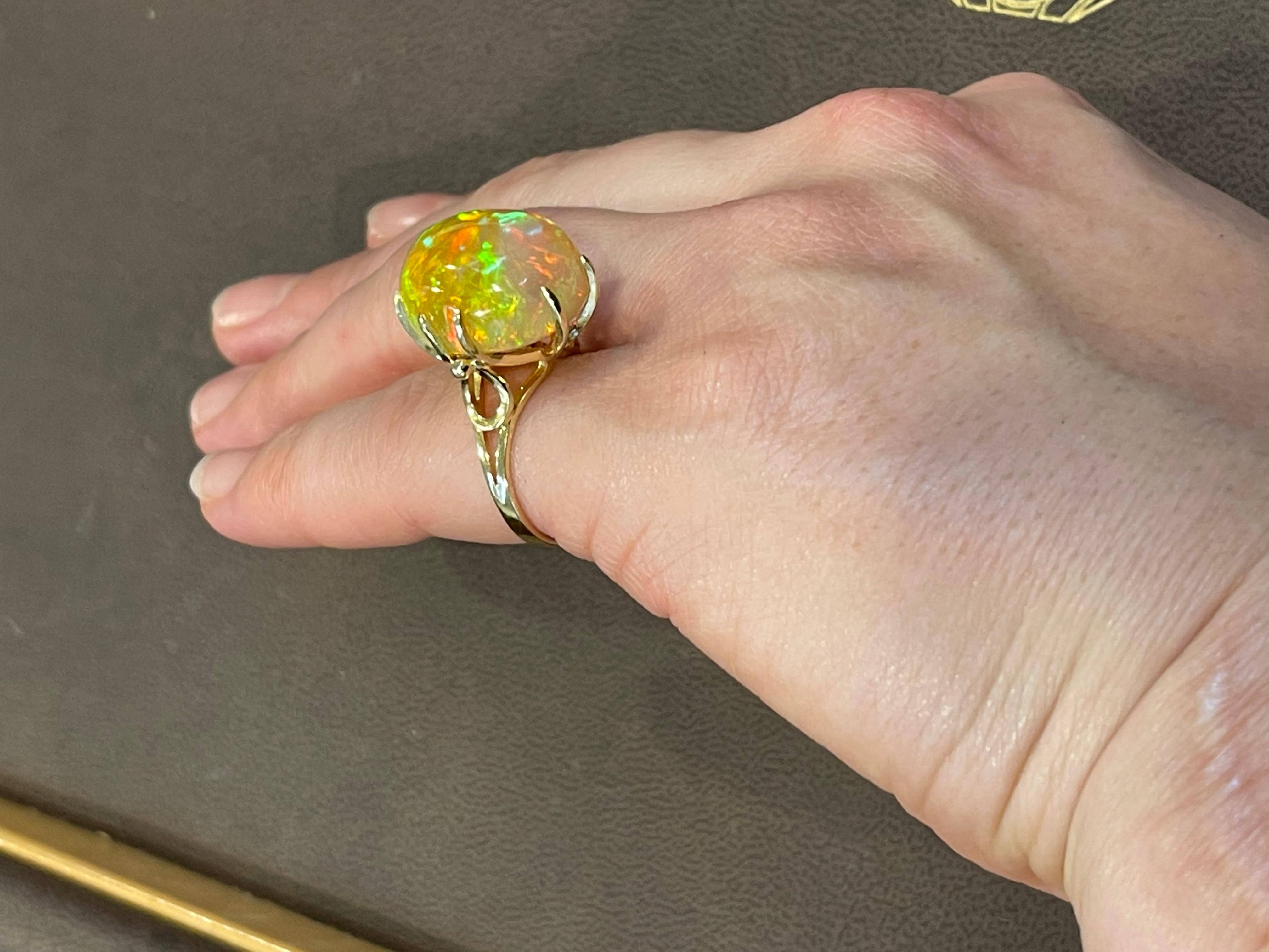 12 Carat Oval Shape Ethiopian Opal Cocktail Ring 14 Karat Yellow Gold For Sale 10