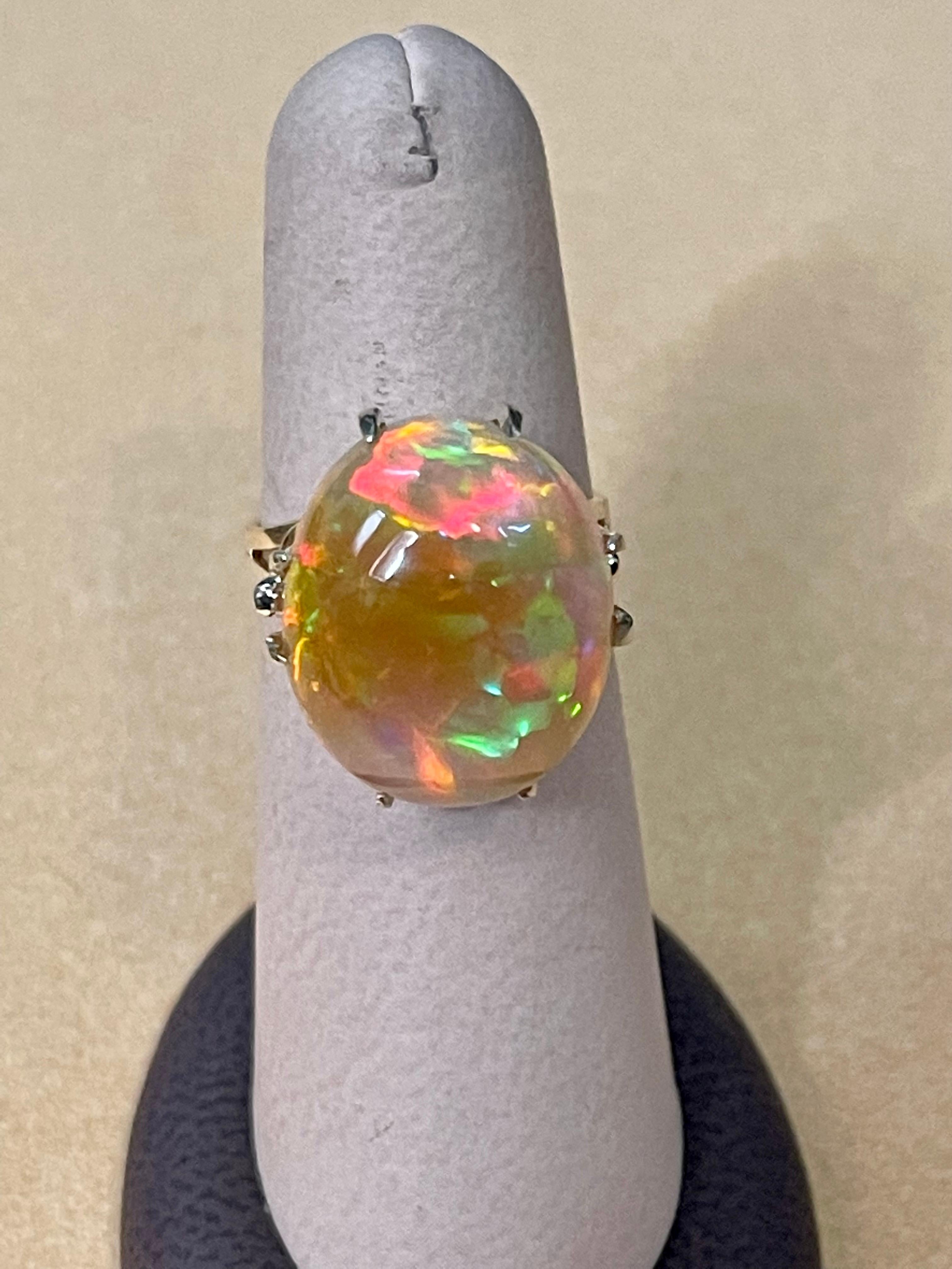 12 Carat Oval Shape Ethiopian Opal Cocktail Ring 14 Karat Yellow Gold For Sale 3