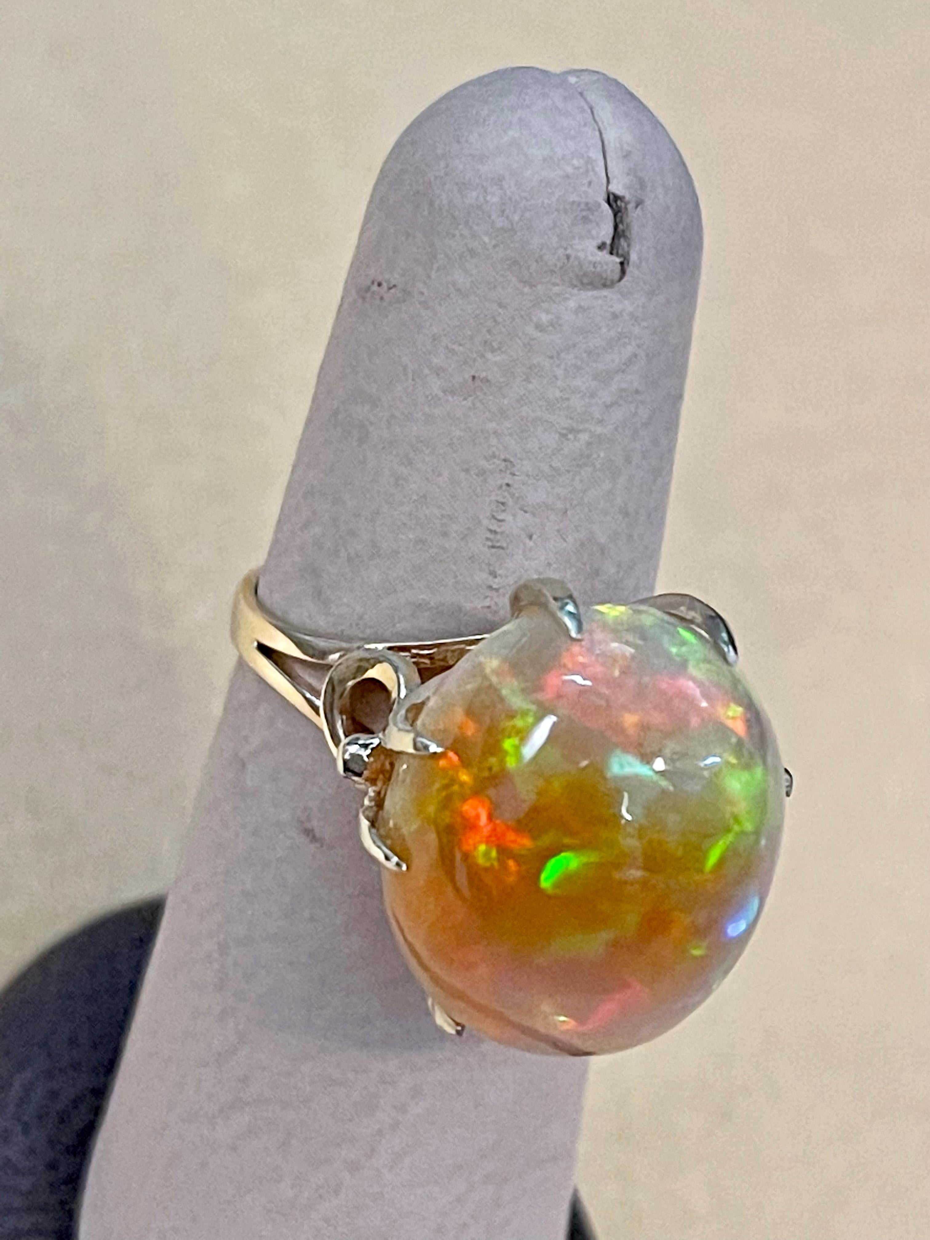 12 Carat Oval Shape Ethiopian Opal Cocktail Ring 14 Karat Yellow Gold For Sale 4