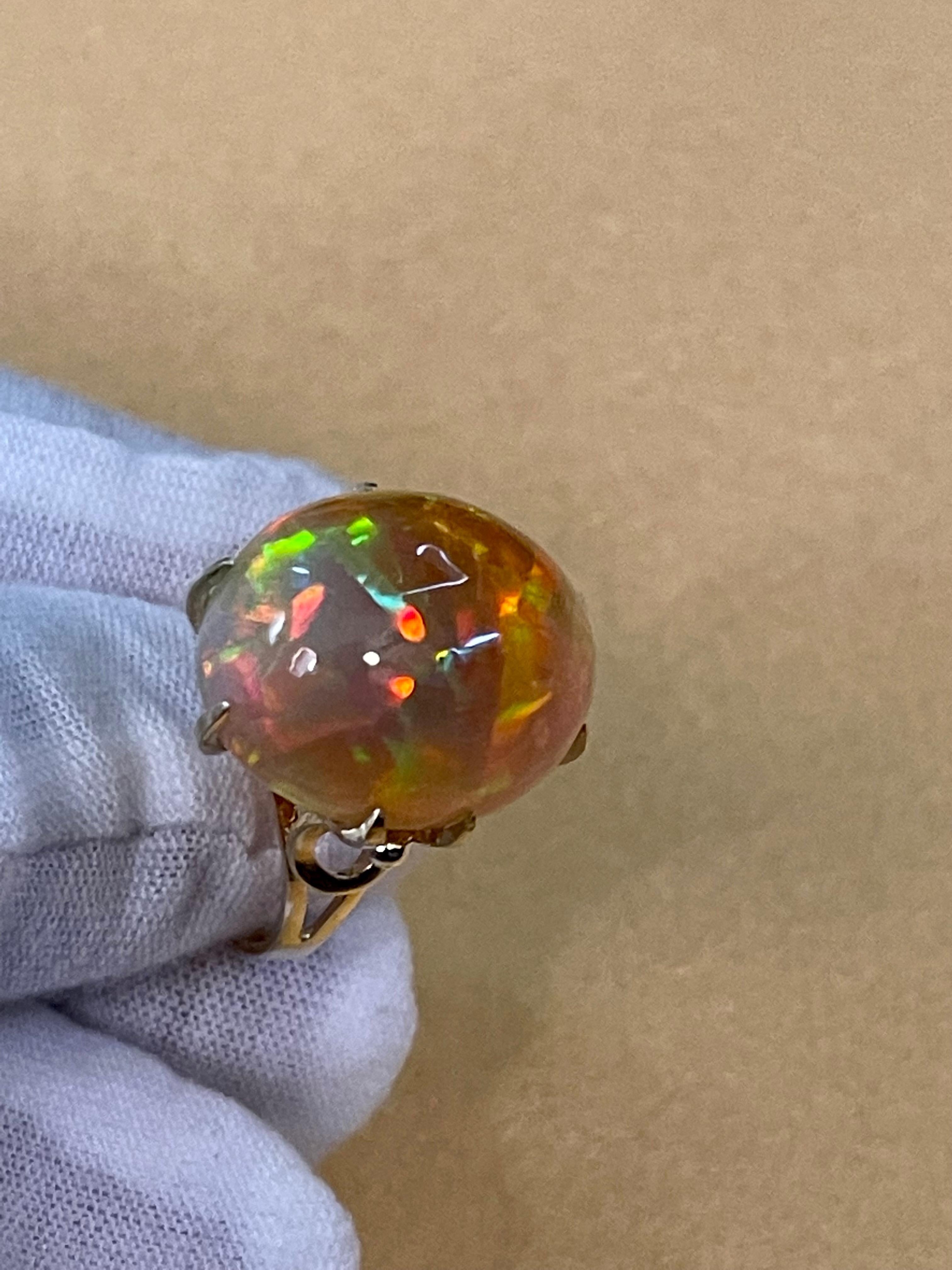 12 Carat Oval Shape Ethiopian Opal Cocktail Ring 14 Karat Yellow Gold For Sale 7