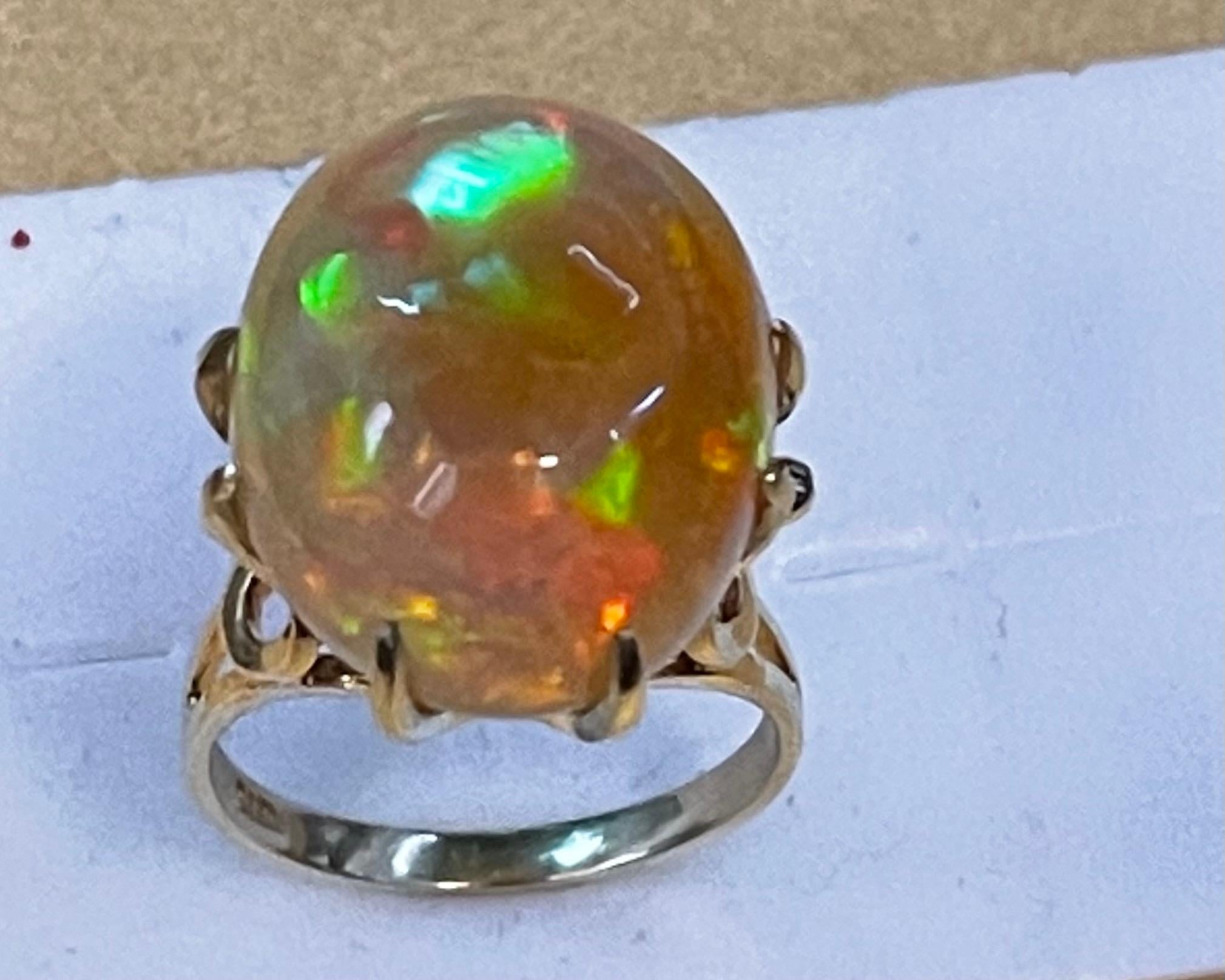 12 Carat Oval Shape Ethiopian Opal Cocktail Ring 14 Karat Yellow Gold For Sale 1