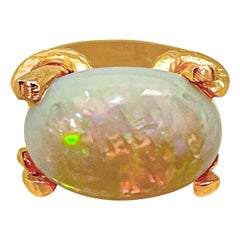 12 Carat Oval Shape Ethiopian Opal Cocktail Ring 21 Karat Yellow Gold Hand Made