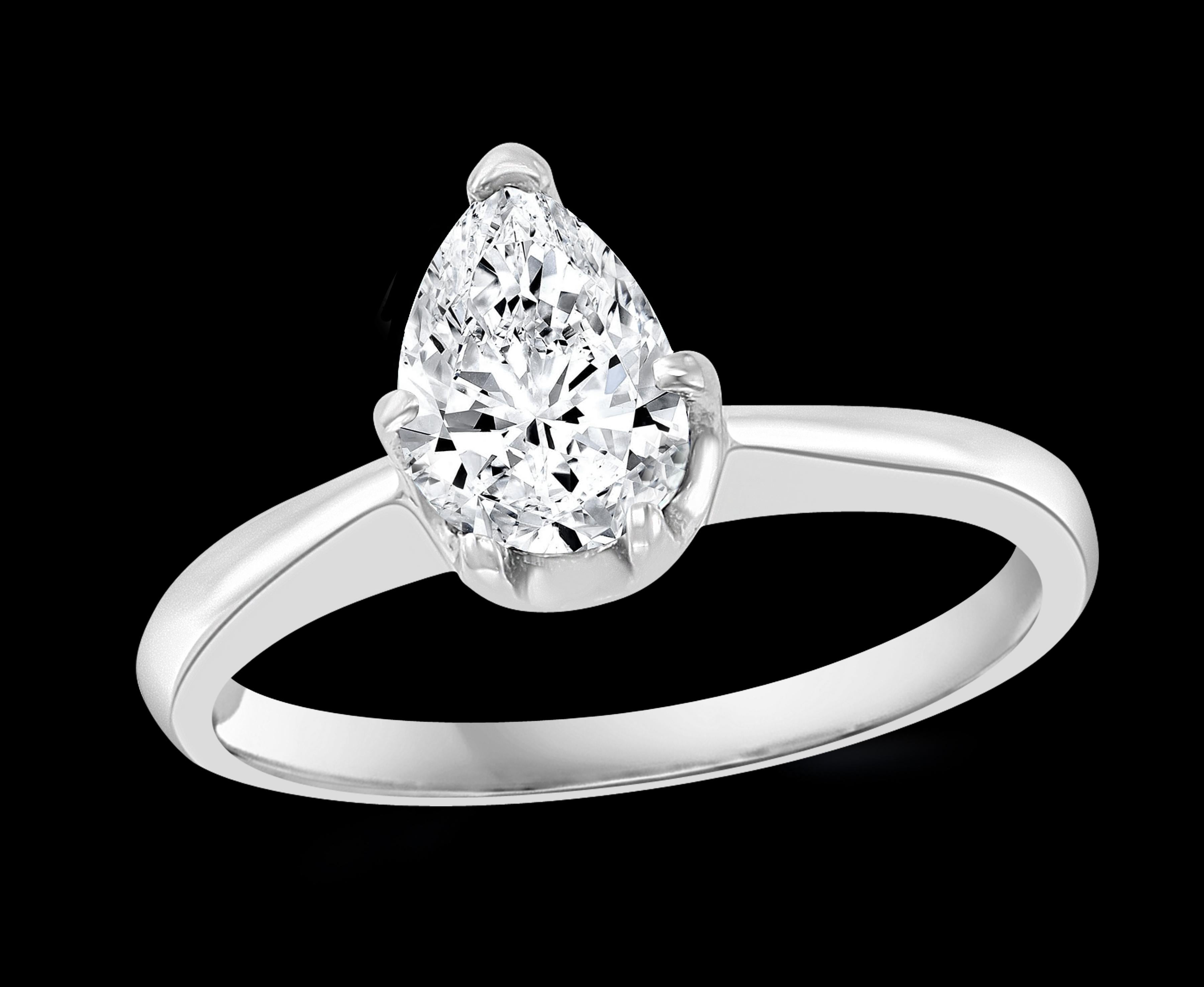Approximately 1.20 Carat Center Diamond Engagement 14 Karat White Gold Ring 
14 K gold Stamped 2.5 Grams
The size of the stone is roughly 8.2 X 6.5 which is almost equal to 1.20 ct approximately.
Eye Clean diamond with lots of sparkle and
