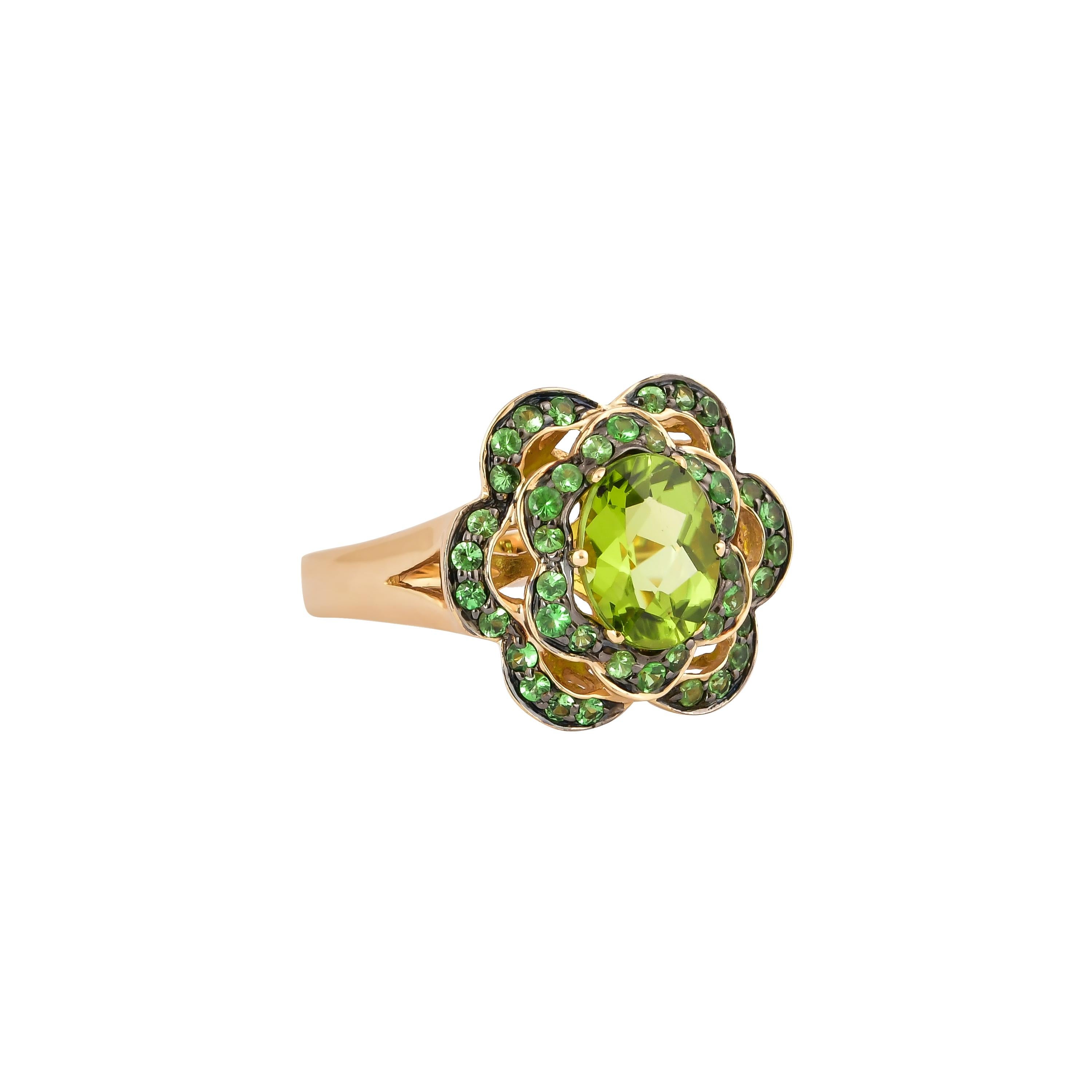 Glamorous Gemstones - Sunita Nahata started off her career as a gemstone trader, and this particular collection reflects her love for multi-colored semi-precious gemstones. This ring presents a cluster of the most precious peridots accented with