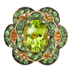 Bague en or jaune 14 carats avec péridot de 1,2 carat et tsavorite