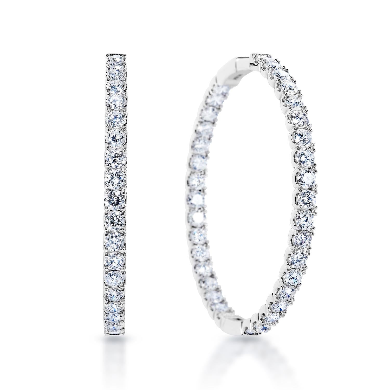 Diamond Hoop Earrings:

Carat Weight: 11.60 Carats
Shape: Round Brilliant Cut
Metal: 14 Karat White Gold
Style: Hoop Earrings