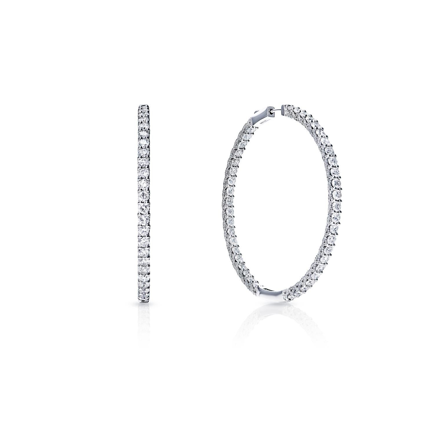 Diamond Hoop Earrings For Ladies:

Carat Weight: 11.61 Carats
Style: Round Brilliant Cut
Metal: 14 Karat White Gold
Style: Hoop Earrings