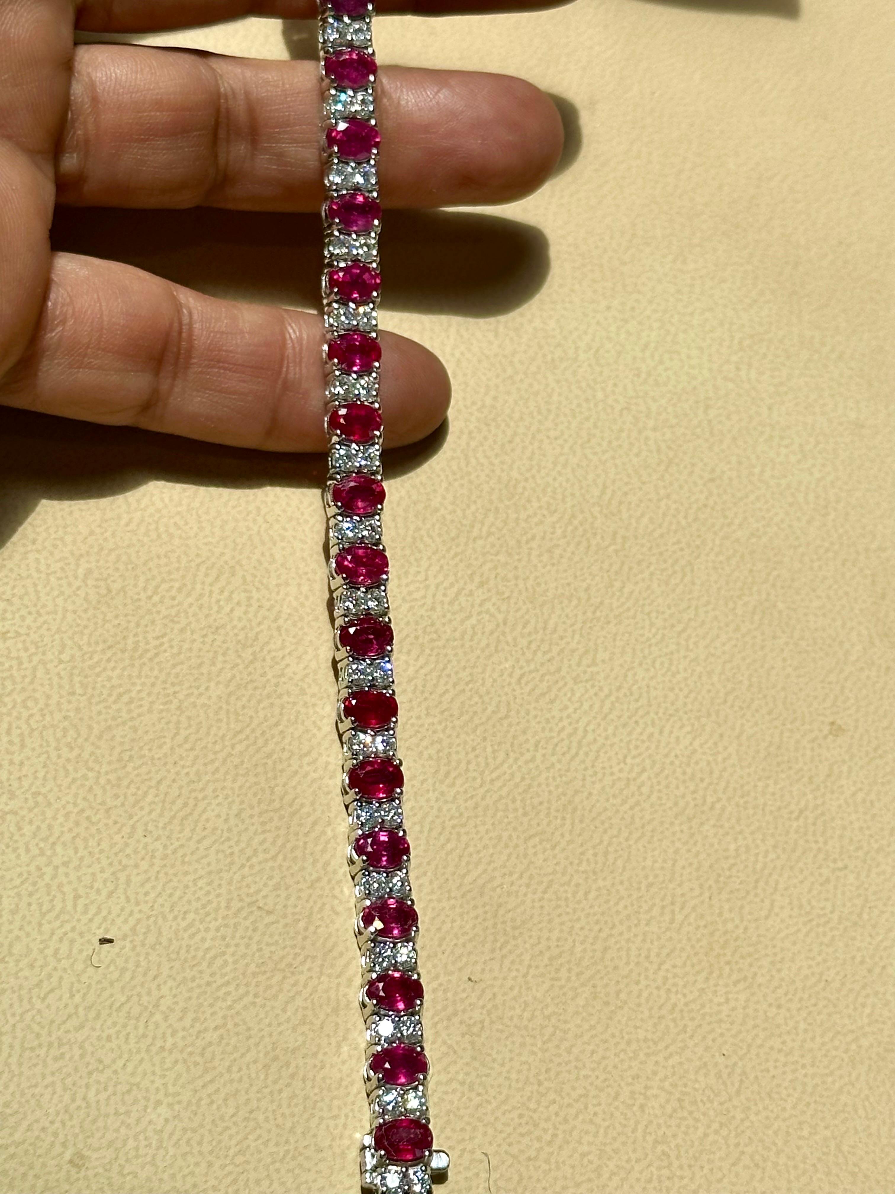 12 Carat Treated Ruby & 2.8 Carat Diamond Tennis Bracelet 14 Kt Yellow Gold
 This exceptionally affordable Tennis  bracelet has  22 stones of  Treated  oval shape  quality  Ruby . Each Ruby is spaced by two diamonds .Total weight of Ruby is 