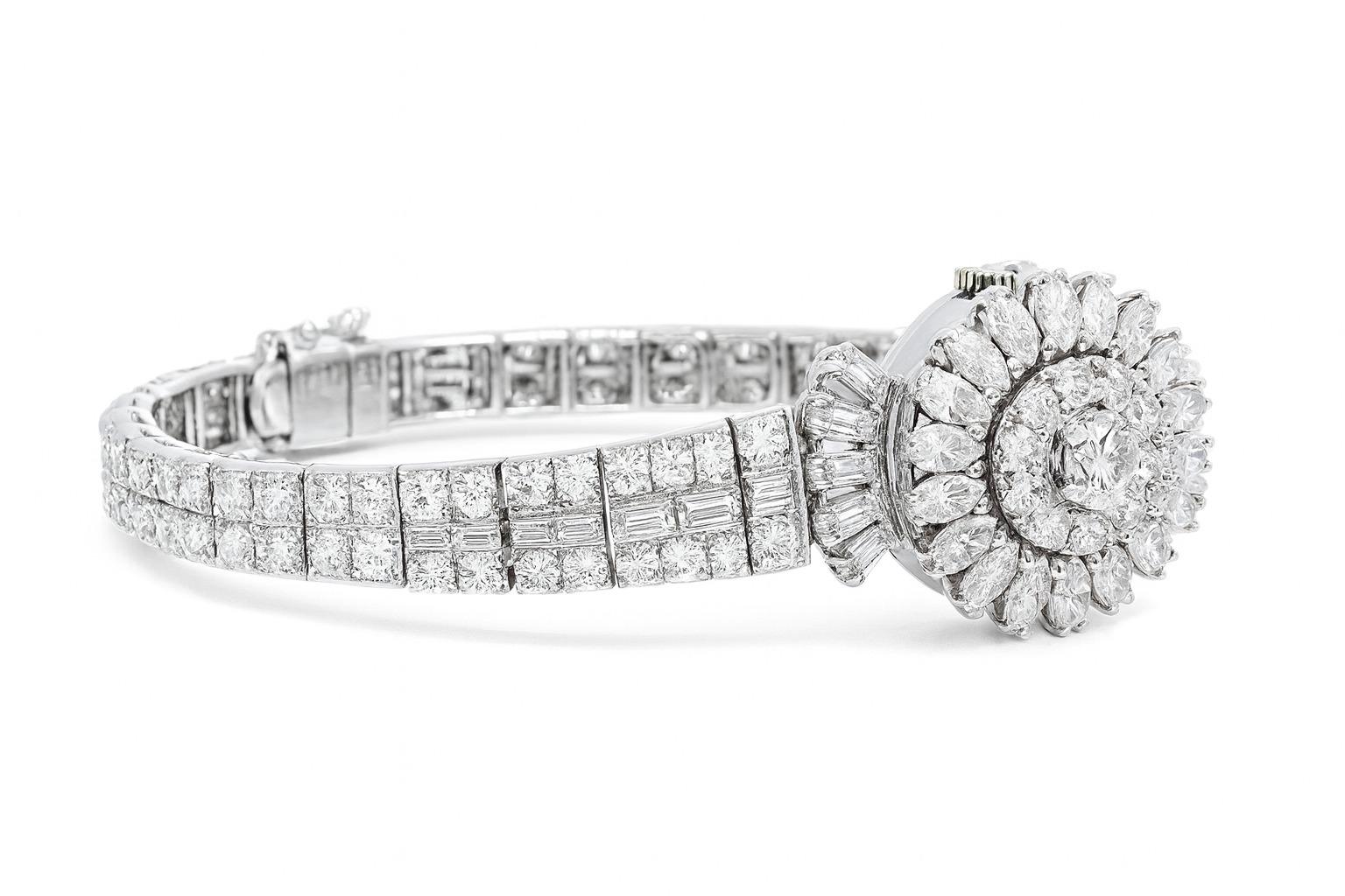 Vintage Estate Hamilton Platino Baguette Marquesa Redonda Diamante Reloj Oculto

Exquisito reloj Hamilton vintage con diamantes ocultos, fabricado en platino macizo y con un peso de 44,6 gramos. La caja mide 19,7 mm de ancho y alberga un movimiento