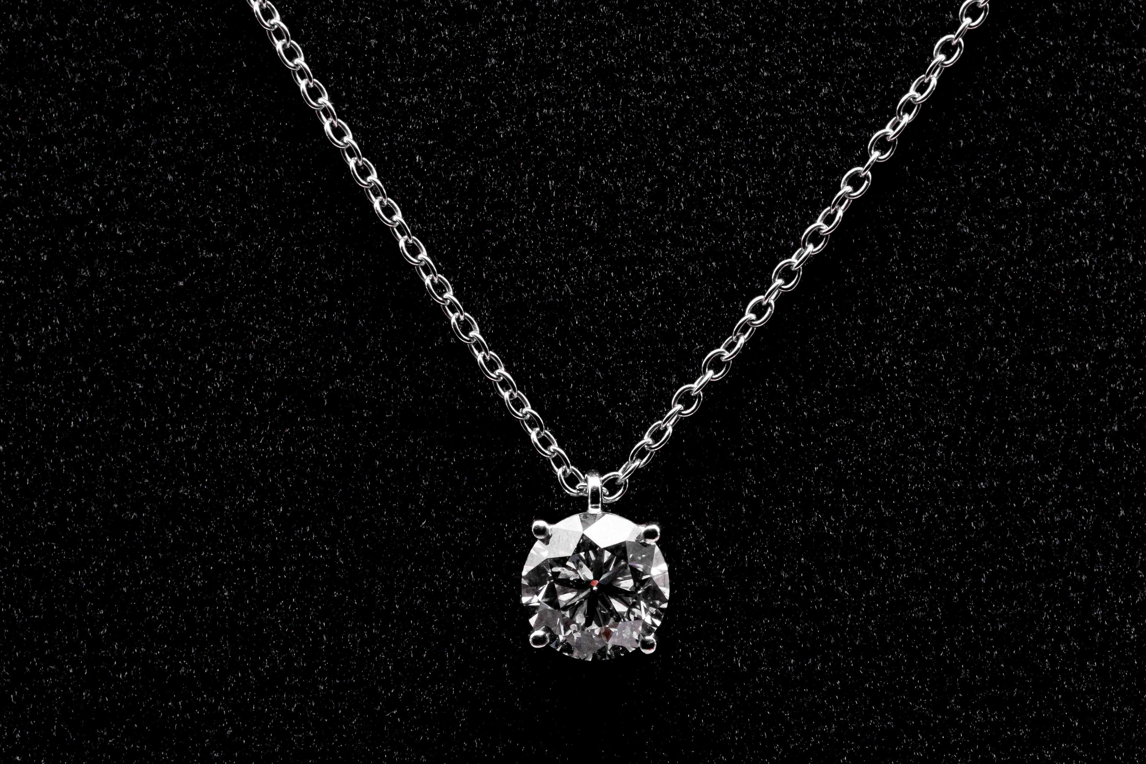 This timeless classic is all about the round brilliant cut stone, a magnificent 1.2 carat VS G color stone, mounted on a refined 18 carat white gold chain. the lenght of the necklace is 41 centimeters and the weight is 2,60 grams
any item of our